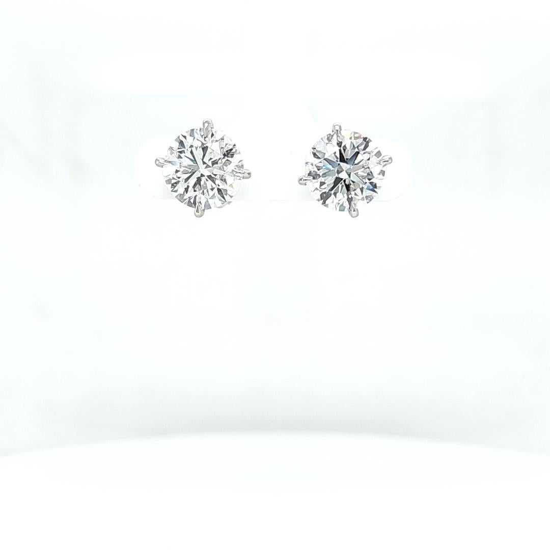 A great premium size pair of diamond studs. The diamonds weigh 3.30 and 3.32 carats each and 9.45 millimeters average diameter. GIA certified G color and Si2 clarity.  A great combination for studs. They are white, bright and eye clean. Tons of fire
