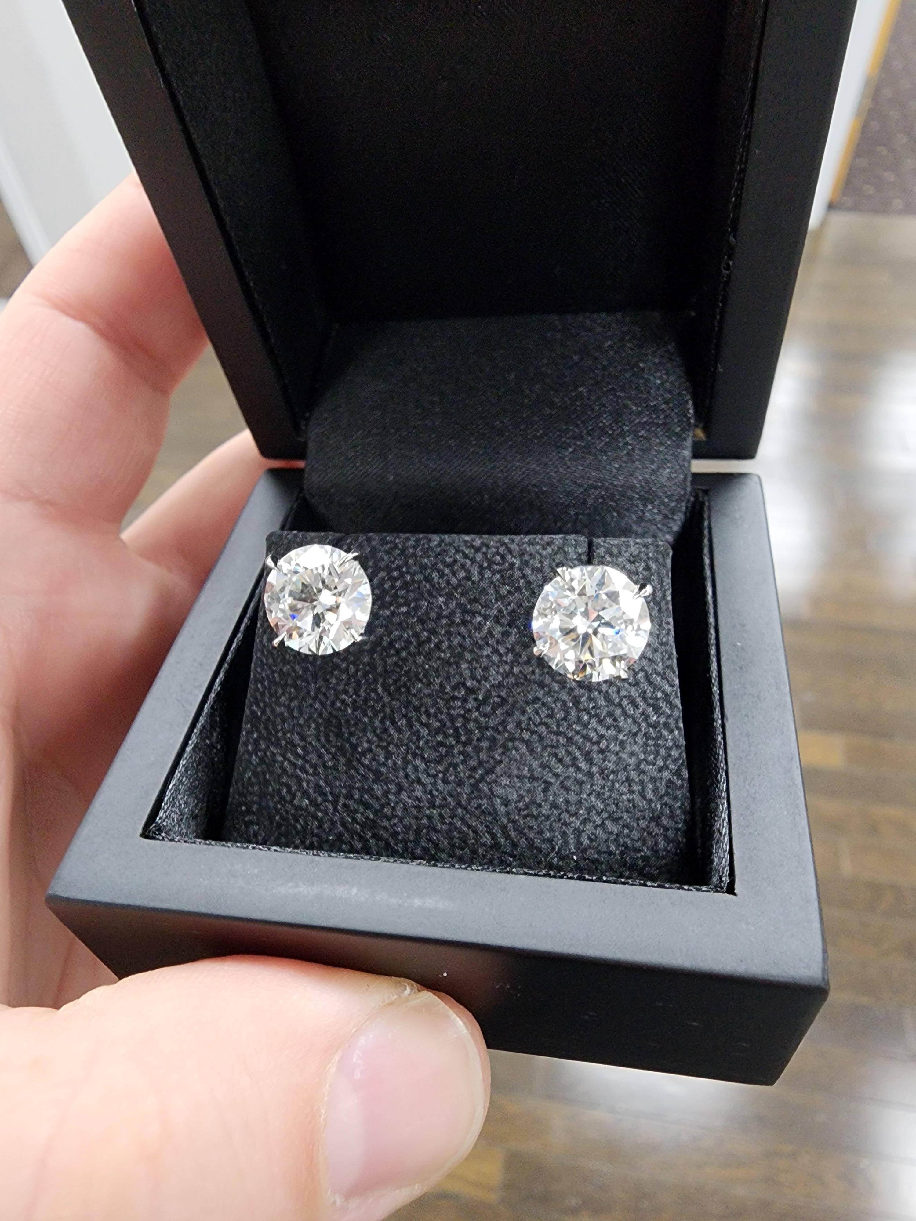 Women's or Men's Louis Newman & Co GIA Certified 6.62 carats total Diamond Studs For Sale