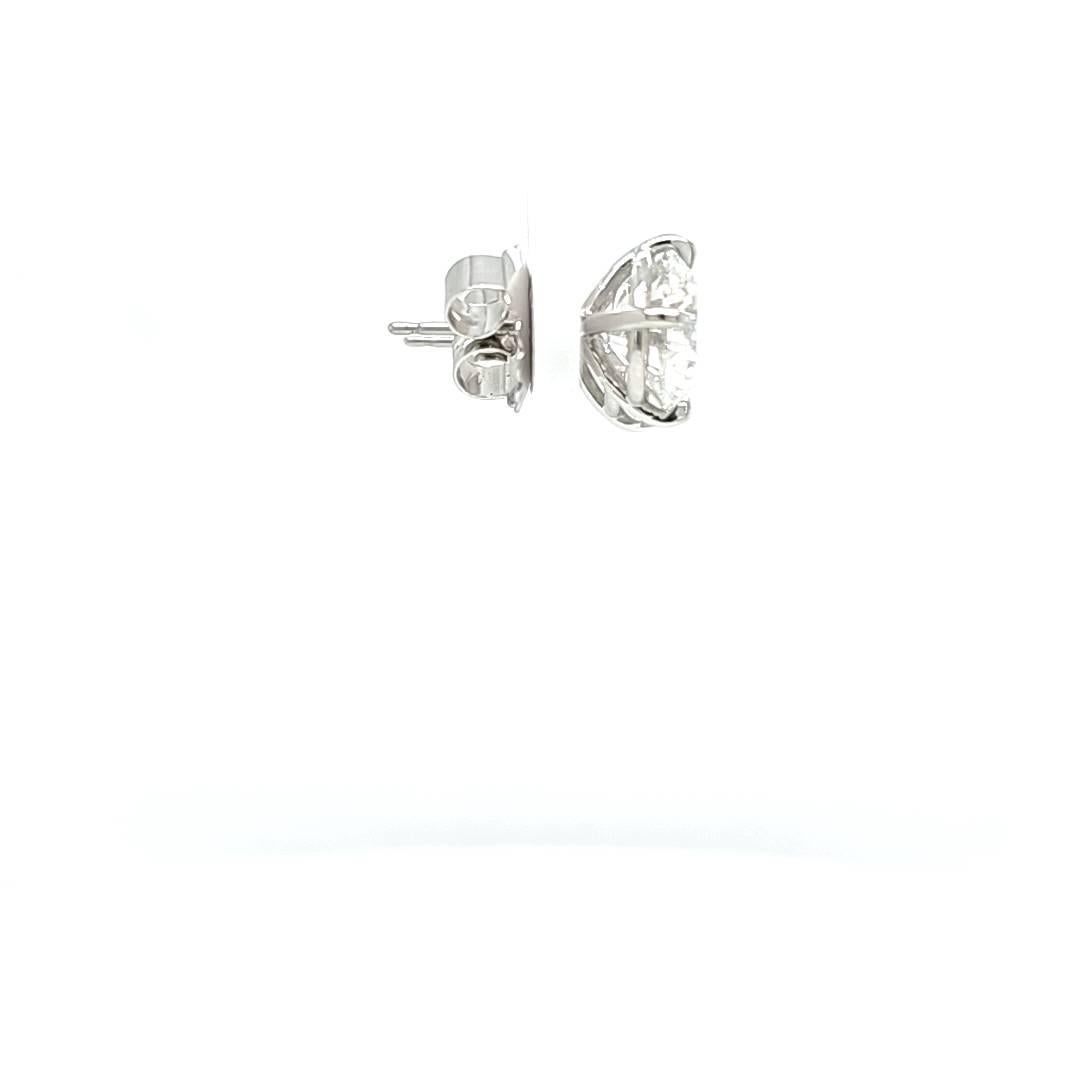 Louis Newman & Co GIA Certified 6.62 carats total Diamond Studs For Sale 2