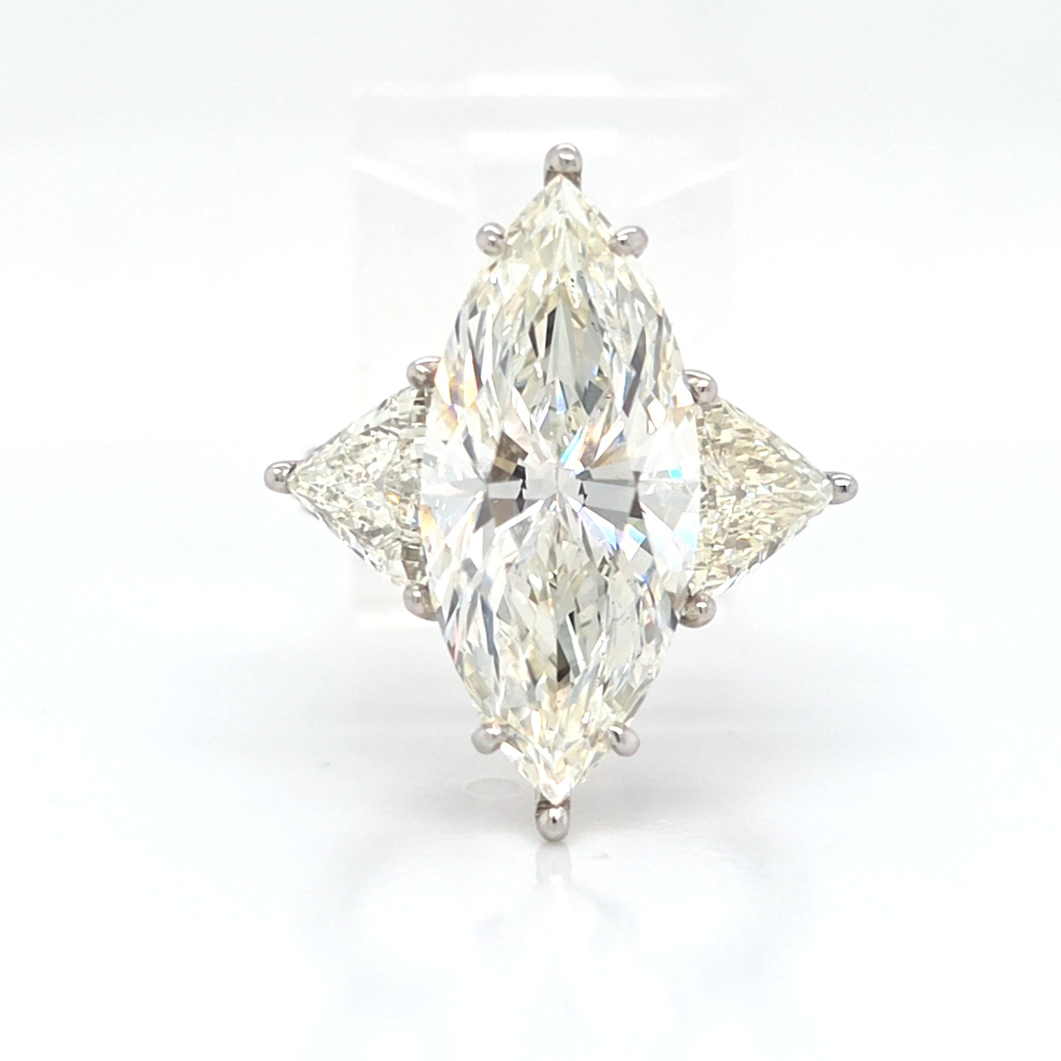 if you are looking for big flash and low cash, look no further. This Elongated Marquise cut is a beauty!. 7.13 carat beautifully cut and elongated with a 2.24 ratio and over 21 millimeters in length. GIA certified L color and SI1 clarity. Appears