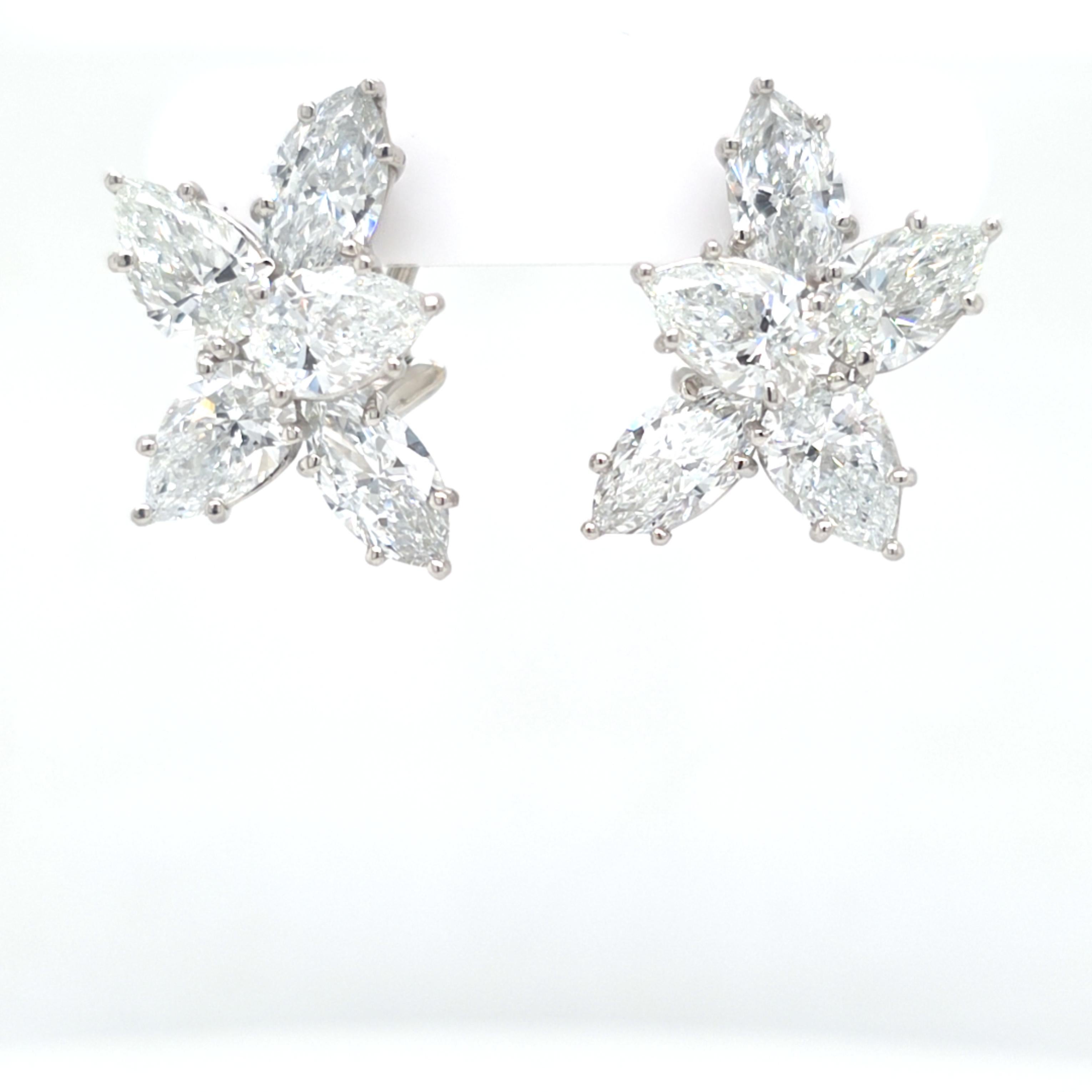 We took 10 Pear shape Cut and Marquise cut GIA certified diamonds and created a cluster earring. 0.70 carat each with all GIA DEF colors and VS/SI Clarities. The perfect size for daily wear or evening wear. The top colors on the diamonds ensure