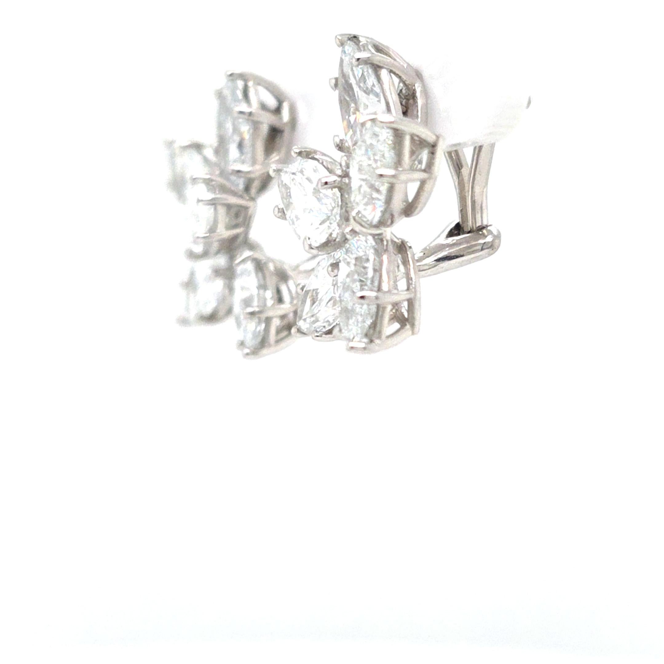 Pear Cut Louis Newman & Co GIA Certified 7.06 Carats Diamond Cluster Earrings For Sale