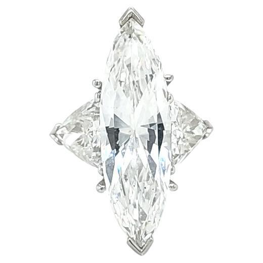 Louis Newman & Co GIA Certified 7.57 Carat Marquise Cut Diamond Three Stone Ring