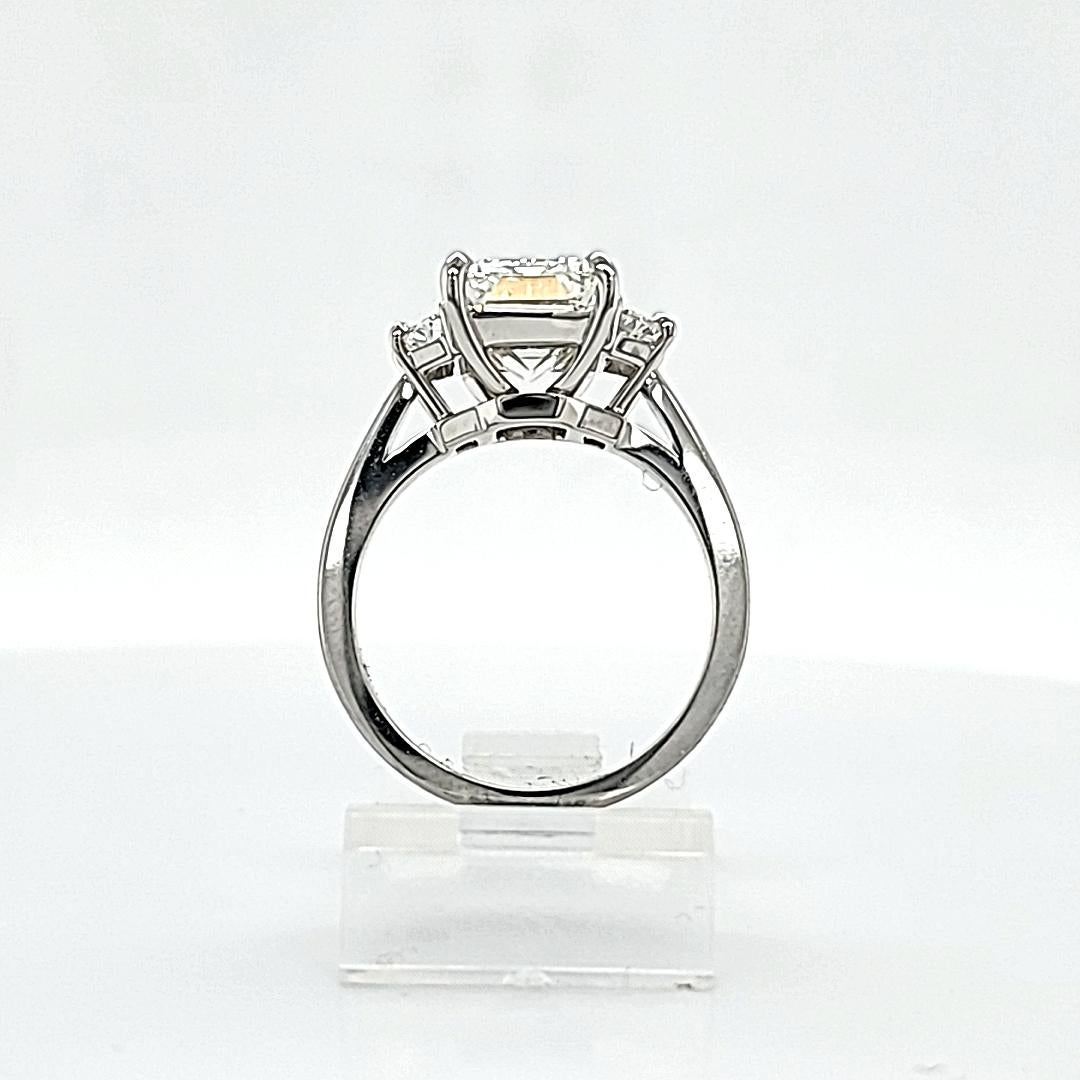 Louis Newman & Company 4.01 Carat Emerald Cut GIA Diamond Three Stone Ring In New Condition In New York, NY