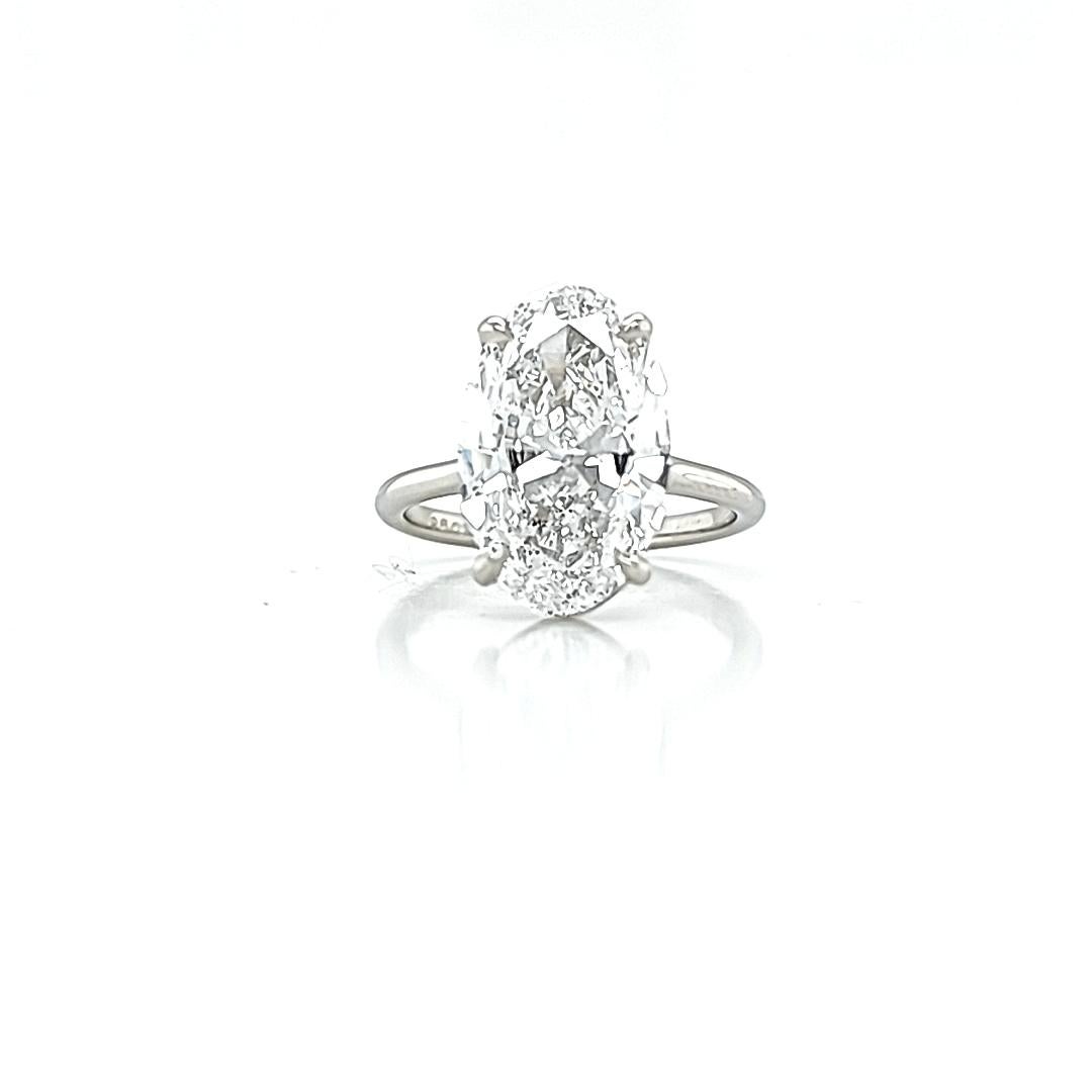 GIA Certified 5.02 Carat Oval Diamond Solitaire Ring 1
