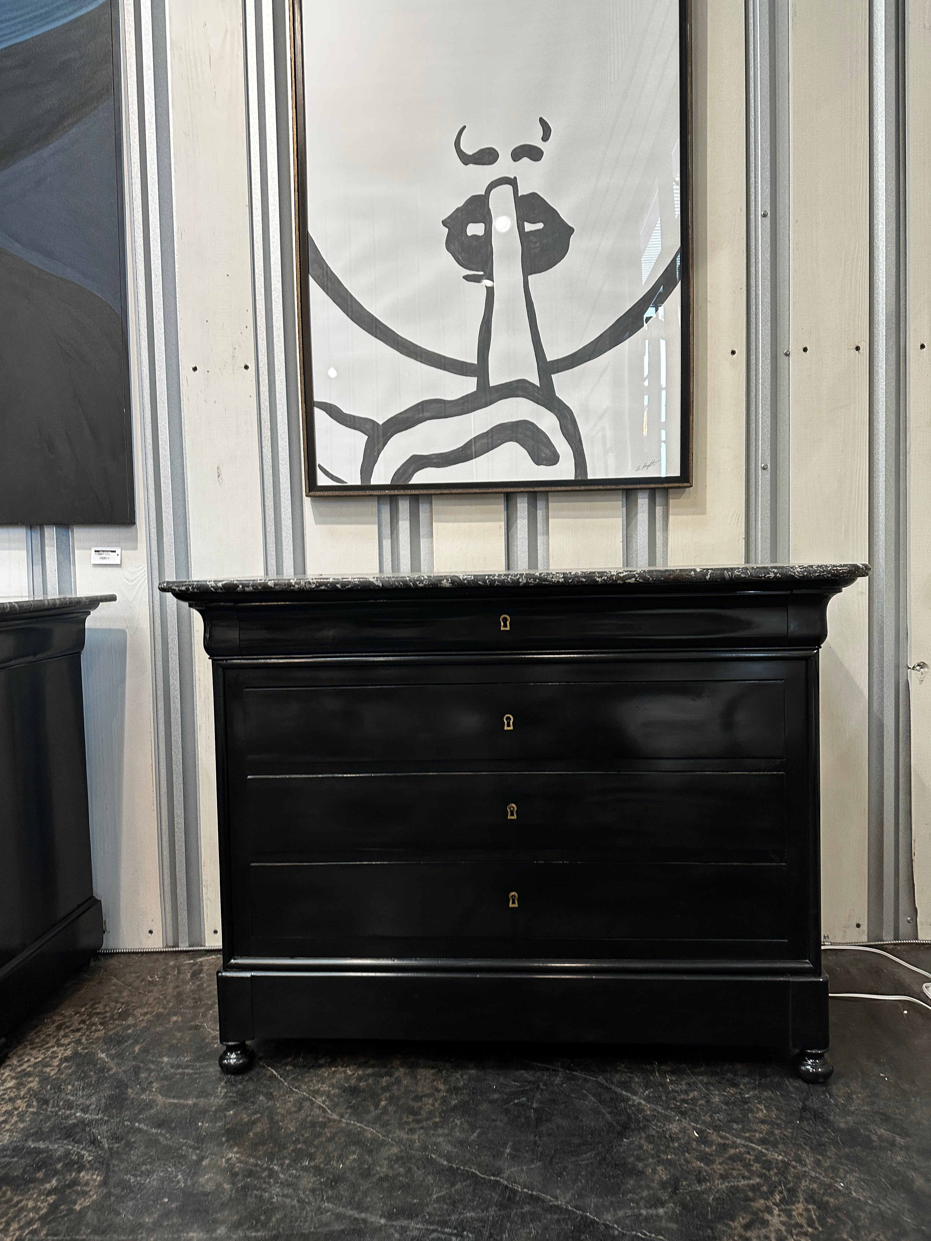 Beautiful Louis Philipe commode chest of drawers.  we have refinished the piece in a beautiful piano black lacquer.  the commode retains its original brass hardware and original beautiful grey and white marble.  
This piece can be paired with a very