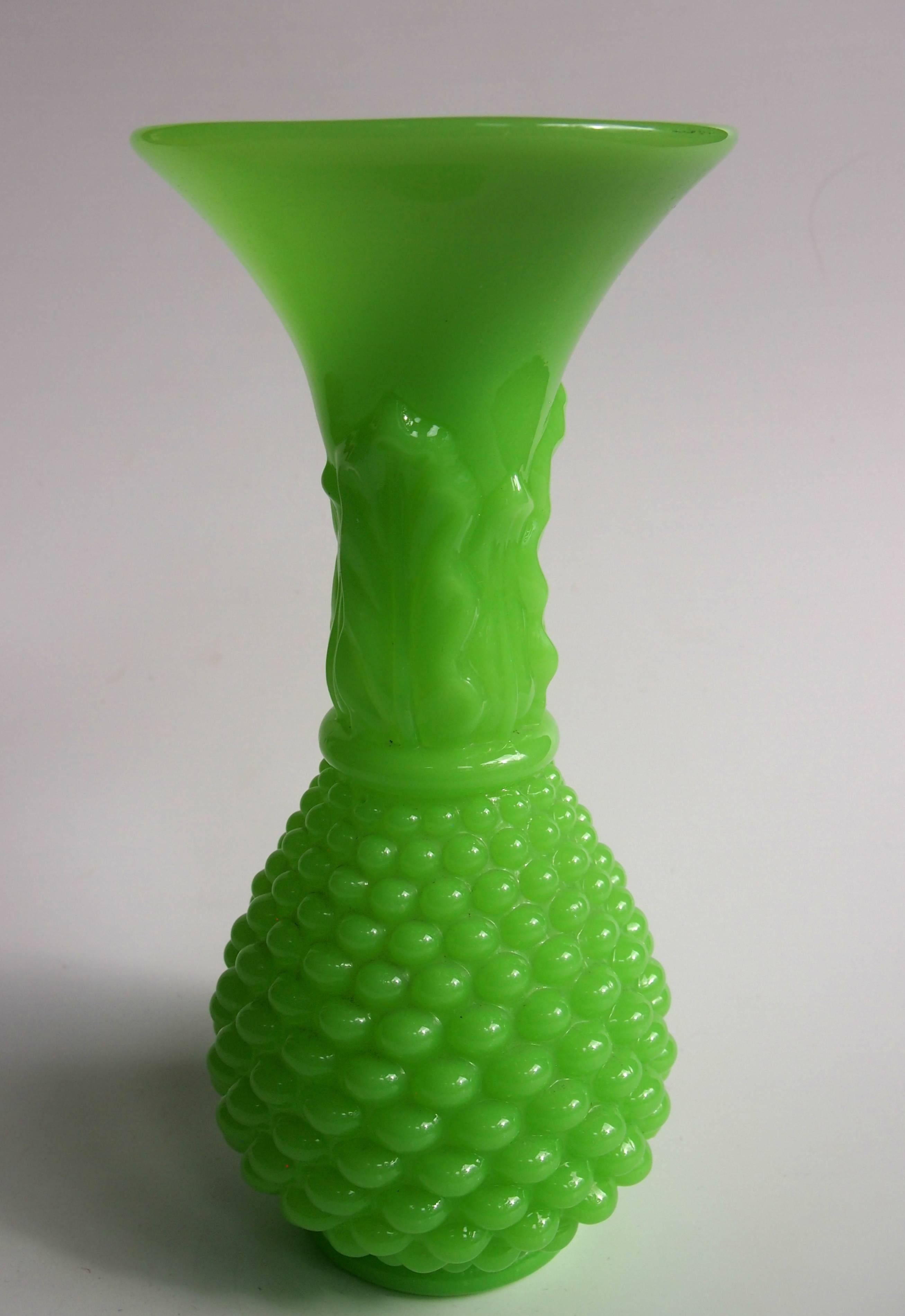 Classic Louis Philippe Baccarat Perroquet (literally parrot green) Pineapple vase with 'blind' decoration. According to references this style and color were first created at Baccarat in 1842 by Francois-Eugene de Fontenay.

Baccarat is, and has