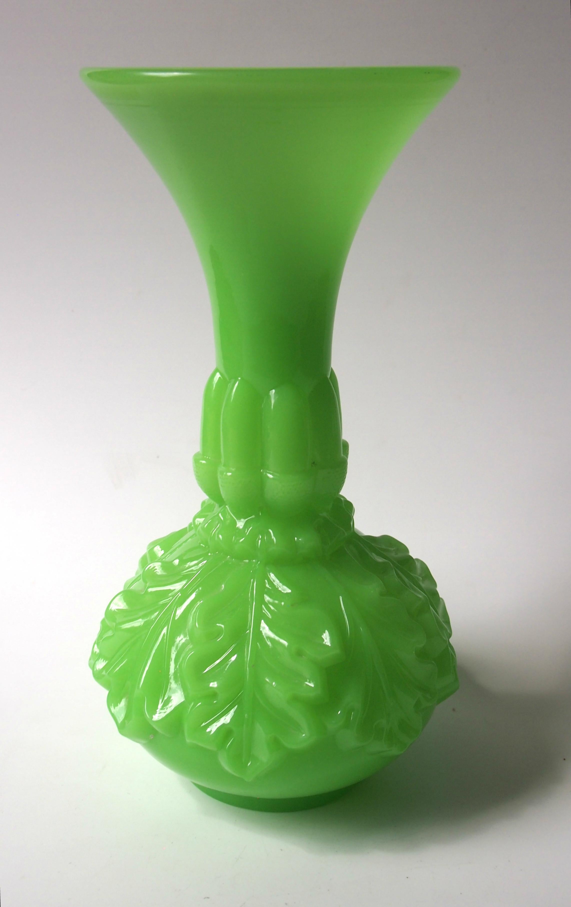 Classic Louis Philippe Baccarat Perroquet (literally parrot green) vase with 'blind' decoration. According to references this style and color were first created at Baccarat in 1842 by Francois-Eugene de Fontenay.

Baccarat is, and has been, the