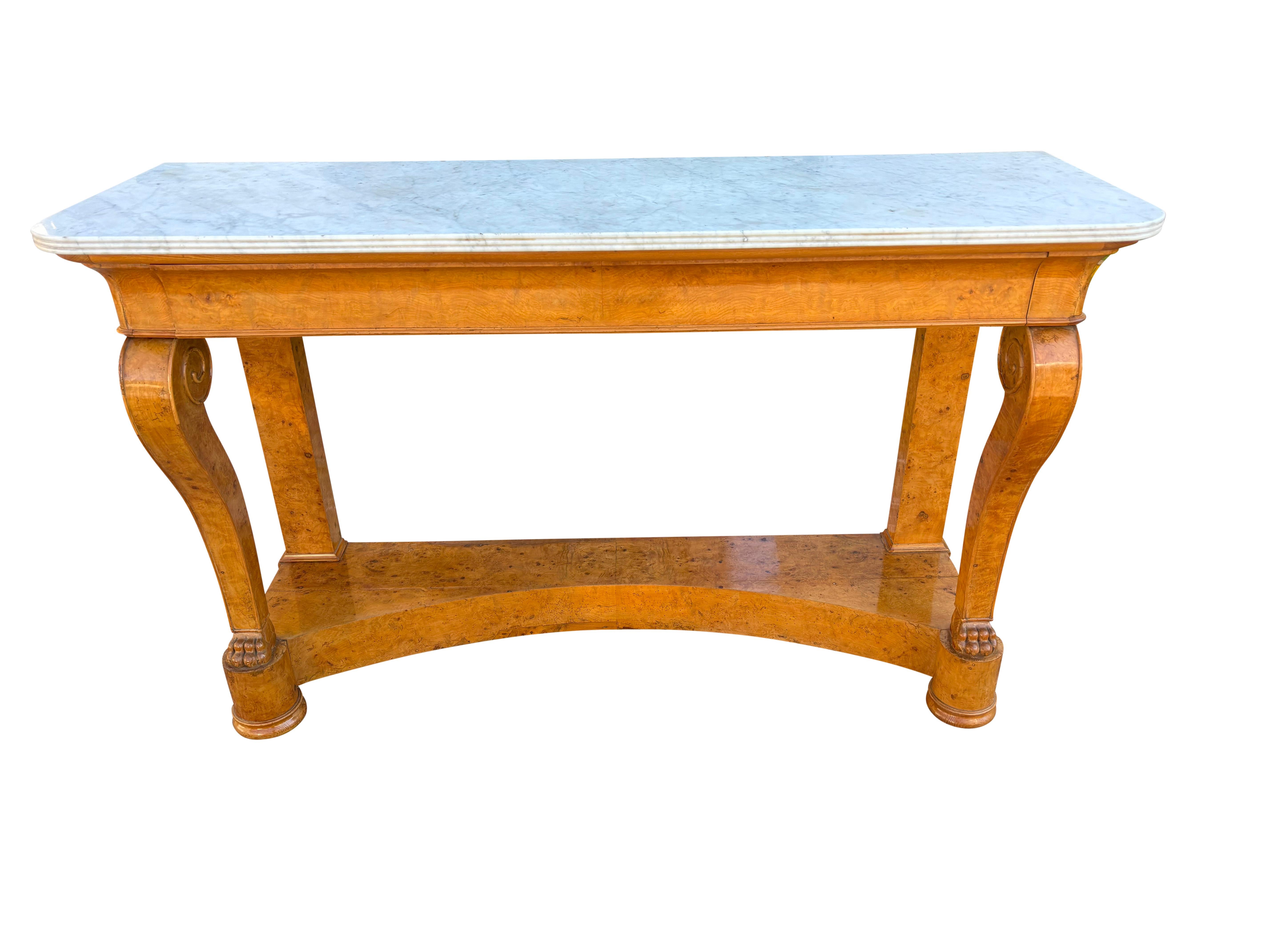 With the original rectangular white marble top with reeded edge over two drawers and cabriole legs terminating on paw feet then a plinth base.