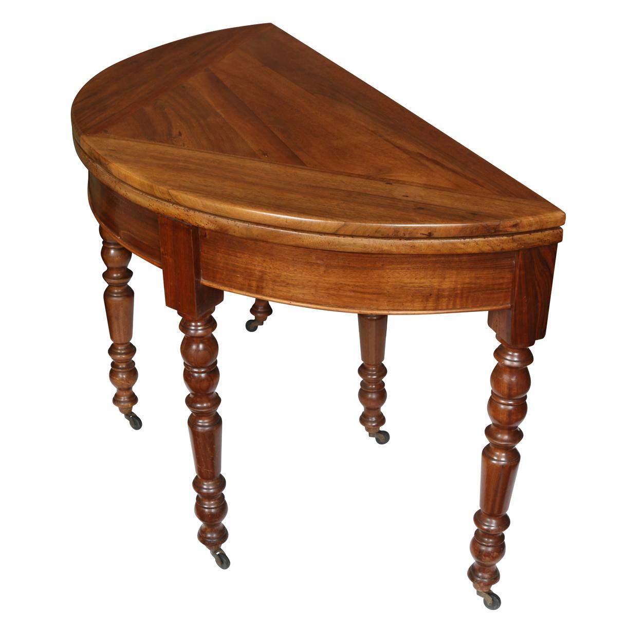 Louis Philippe French fruitwood demilune table with spool design legs on casters.  Opens to a round table