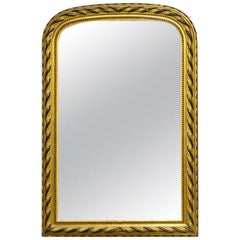 Miroir Louis Philippe doré et ébénisé