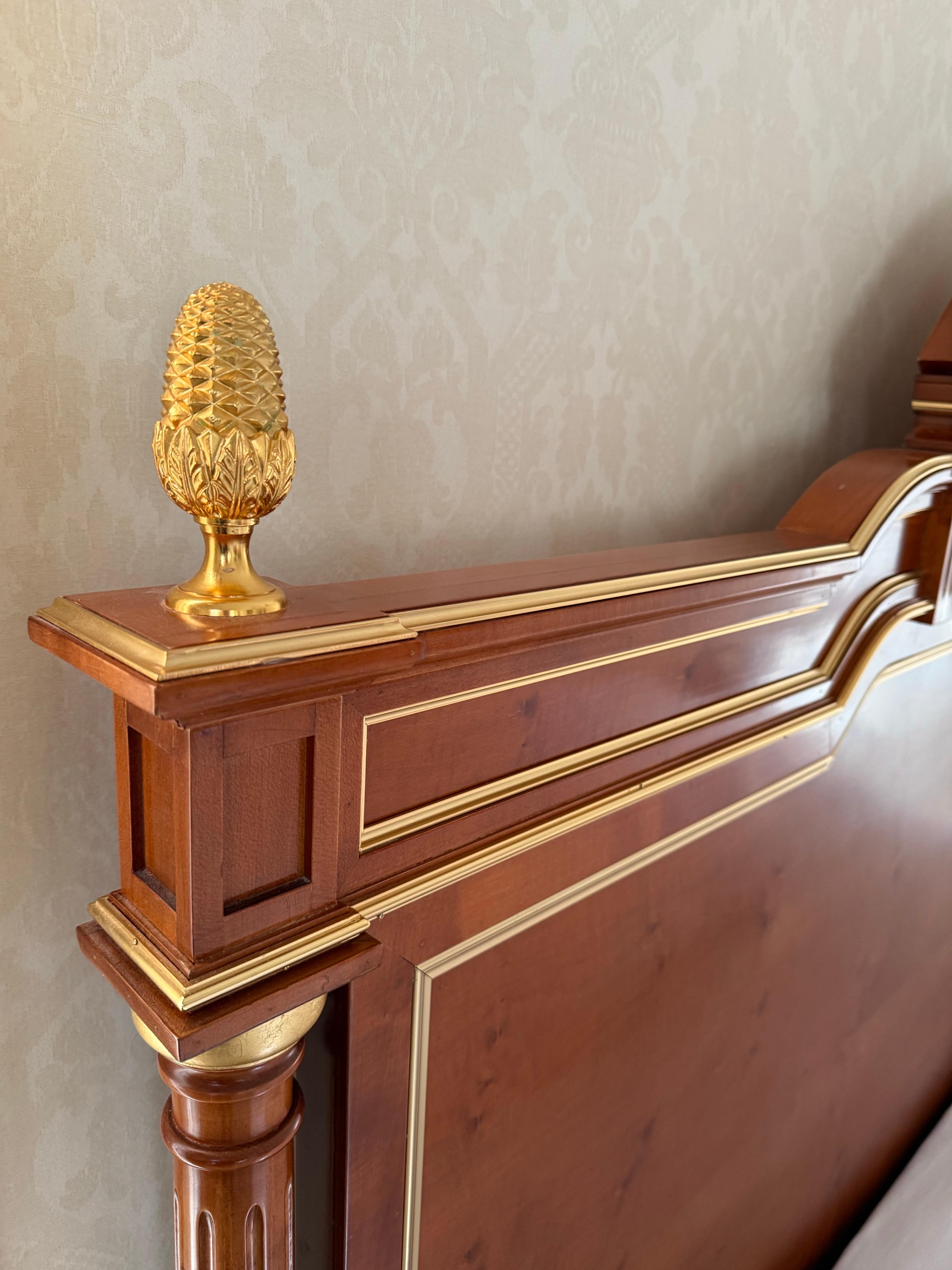Stunning Louis Philippe king size bed with brass inlay including one of a kind finials. We believe this was made in France. Magnificent craftsmanship throughout. Great lines and better scale. Iconic Louis XVI look.  Why not own the best?