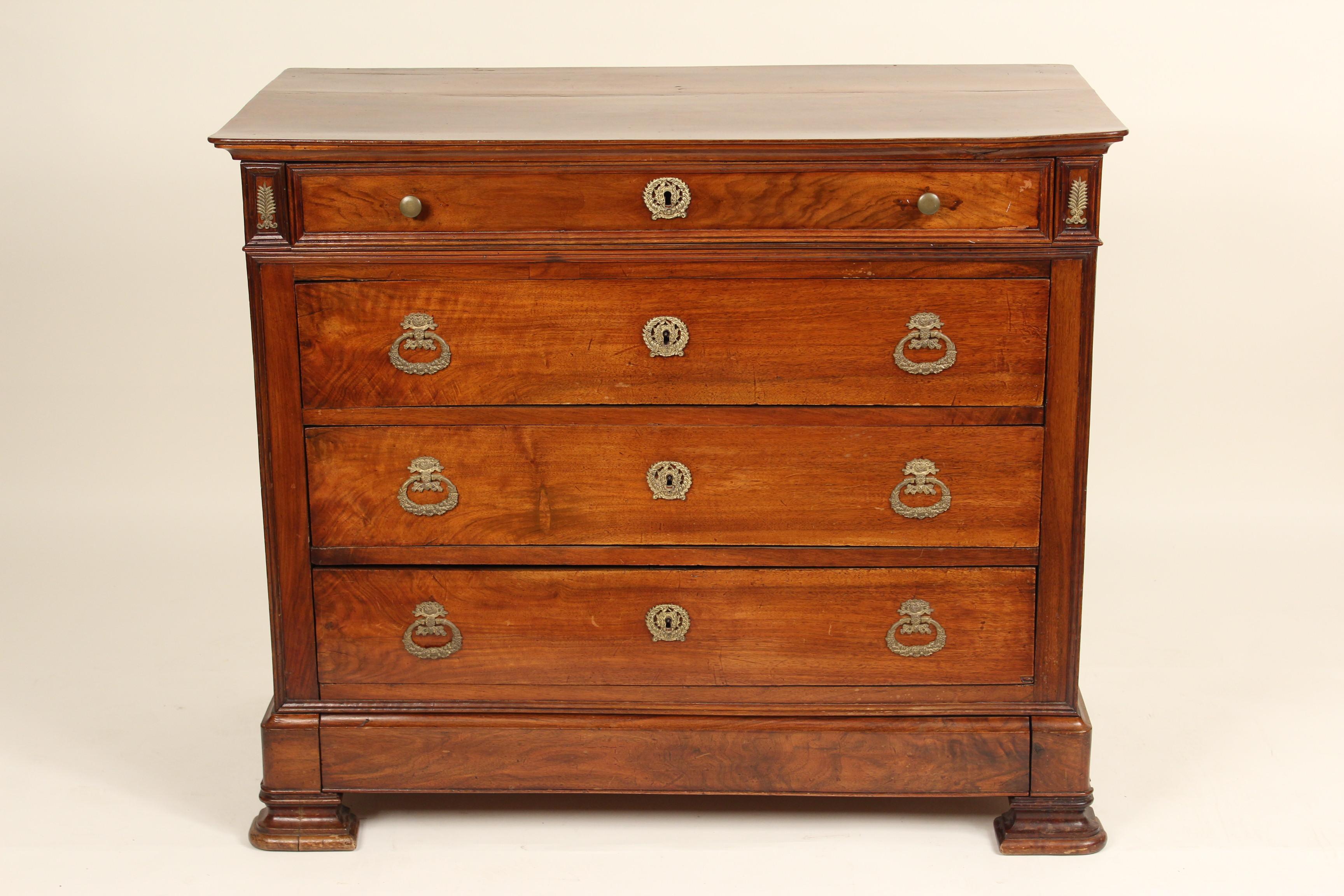 Louis Philippe mahogany chest of drawers with gilt bronze hardware, circa 1840. The mahogany used on this chest has excellent color, grain and patina. The bronze hardware is very fine quality.