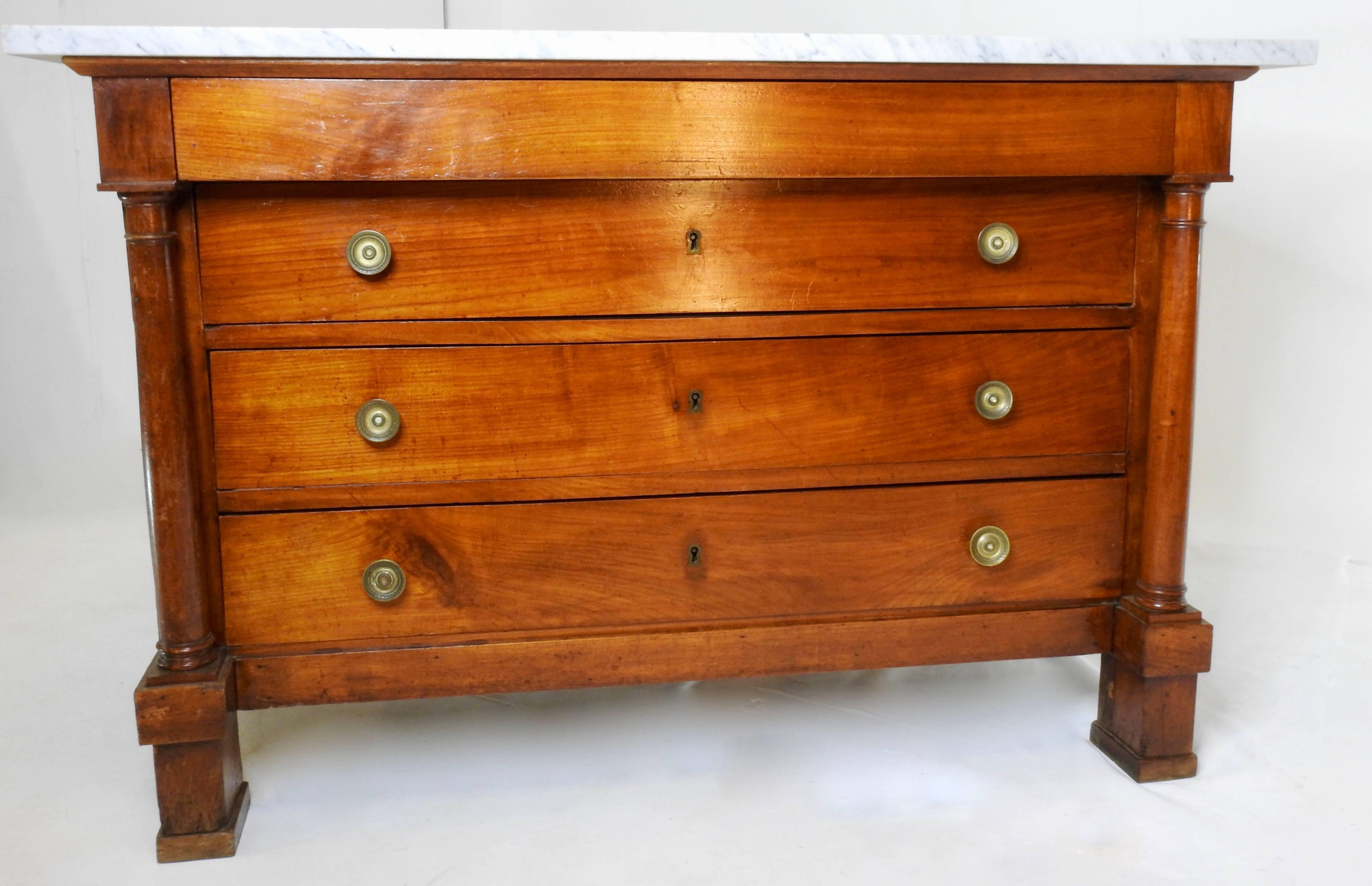 This is a fabulous cherry Louis Philippe marble-top commode with four drawers featuring bronze pulls. The marble top measures: 26.75