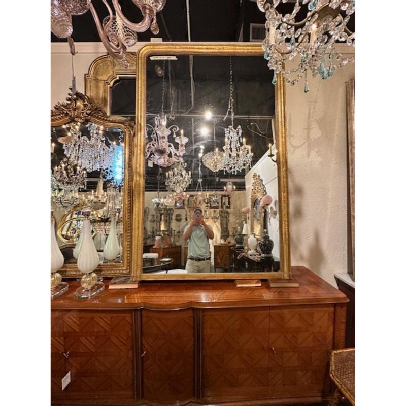 Large scale 19th century French Louis Philippe Mirror with Greek Key frame pattern frame. Circa 1870. A fine addition to any home!