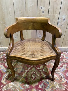 Louis Philippe office armchair in walnut and caning