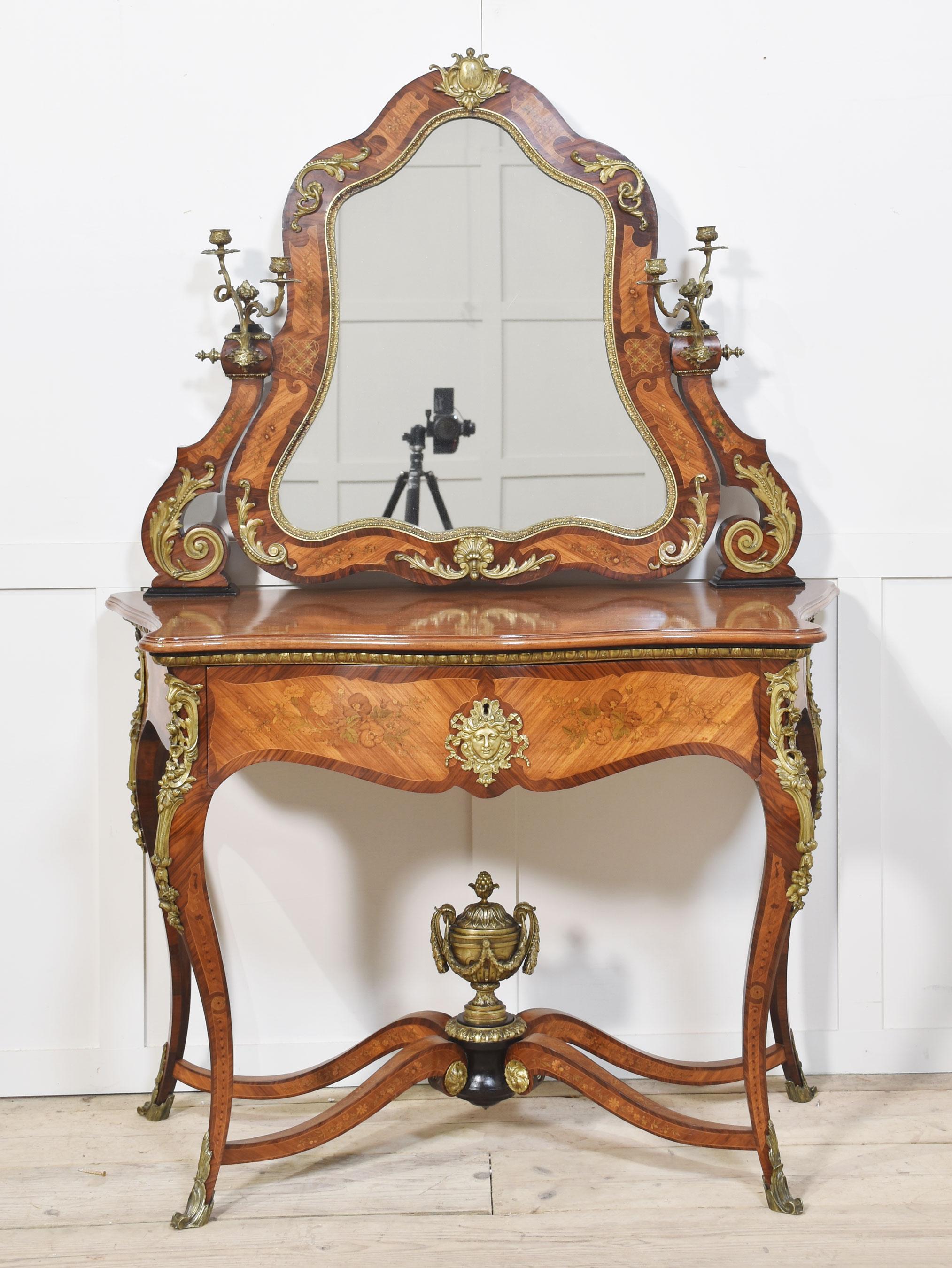 19th-century inlaid dressing table by Maison Pretot Paris. The original adjustable mirror encased in an exquisite frame, having fine inlaid detail and well-cast ormolu mounts. Supported on scrolling arms with unusual Rococo-style candelabras. To the