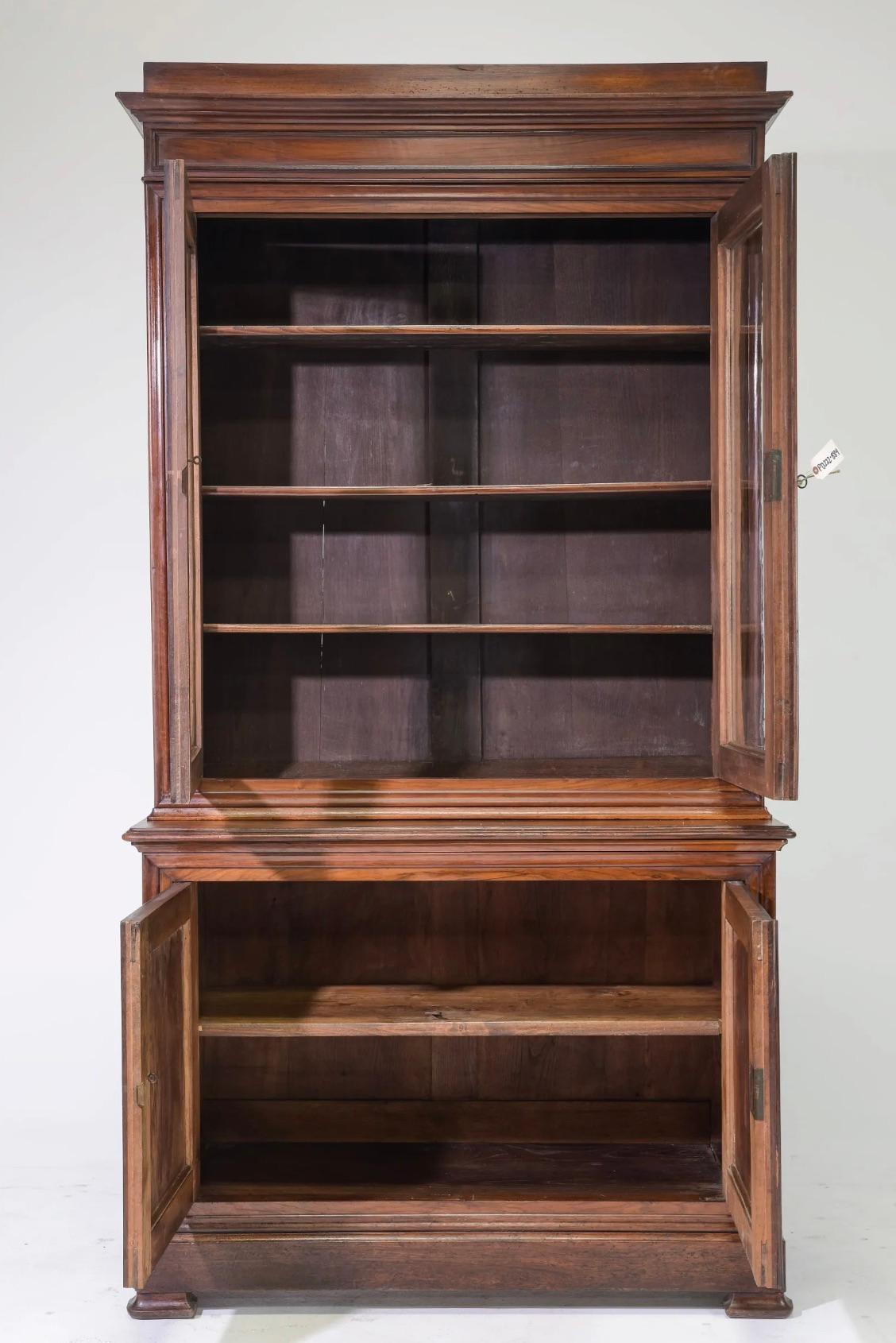  Louis Philippe Style Walnut Step Back Bookcase / Cupboard with Wavy Glass. Louis Philippe period pieces are just as suitable in a classic or modern style interior. Beautifully detailed and crafted to stand the test of time. 