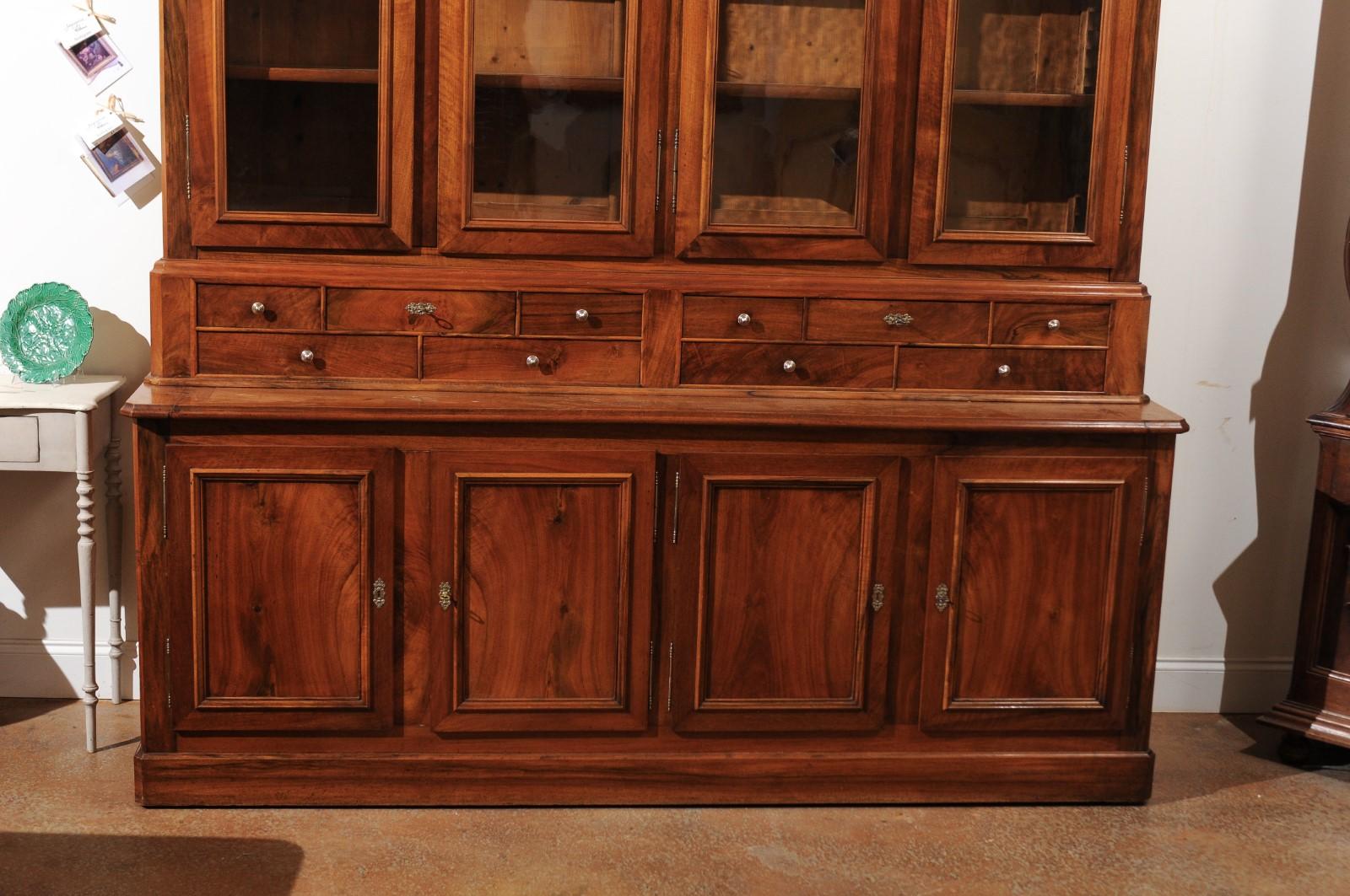 French Louis-Philippe Style 1890s Walnut Bibliothèque with Glass Doors and Drawers