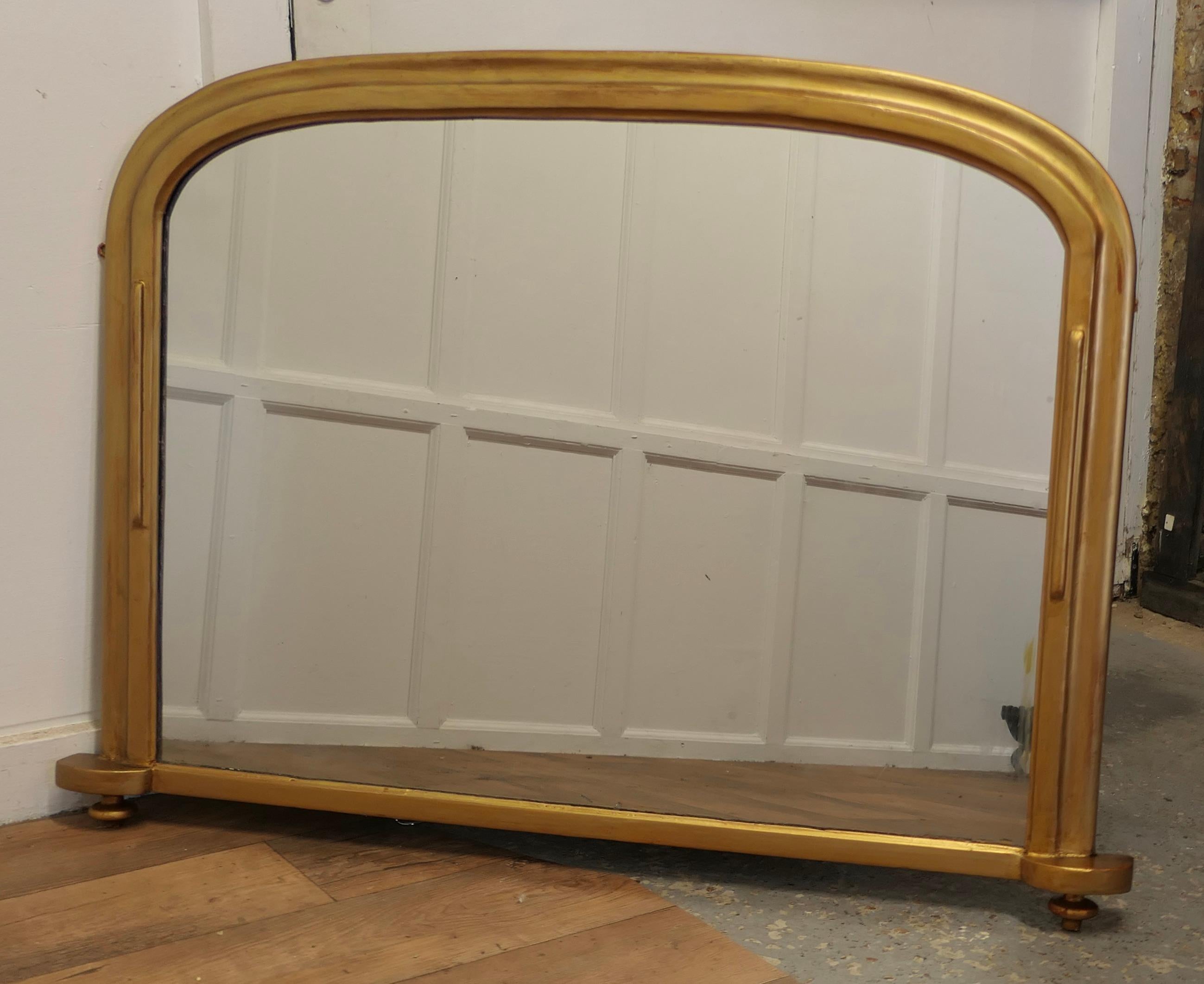 Louis Philippe Style Gold Over-Mantle Mirror

This is a charming piece the curved frame is in Gold, with feet at each end
The Mirror is in good original condition, it is a very heavy piece this is mostly due to the very heavy panelled back

The