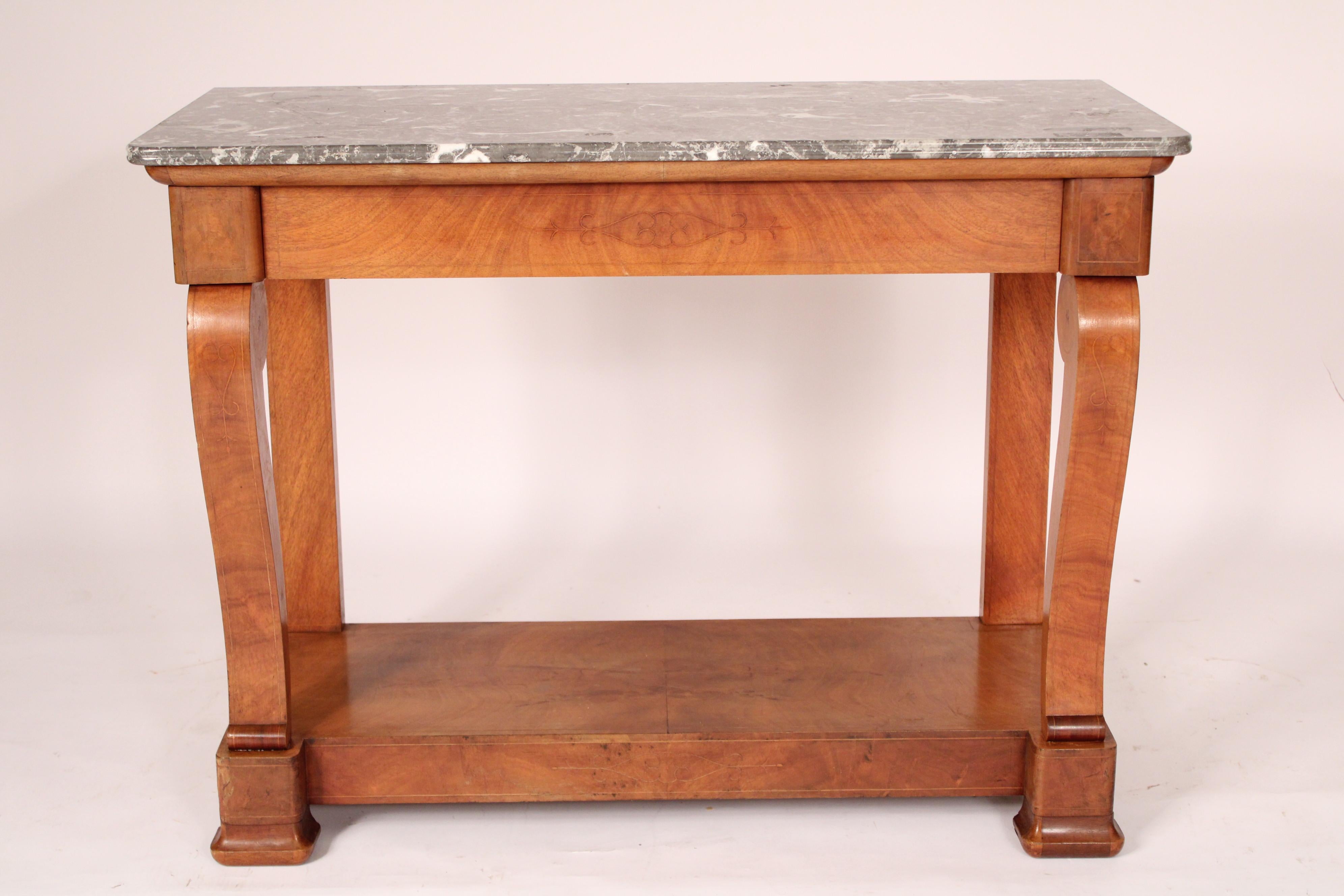 Louis Philippe style mahogany console table with marble top, circa 1930's. With a grey over hanging marble top, a frieze drawer, S shaped supports with line inlay resting on a rectangular plinth base with stepped feet. Hand dove tailed drawer