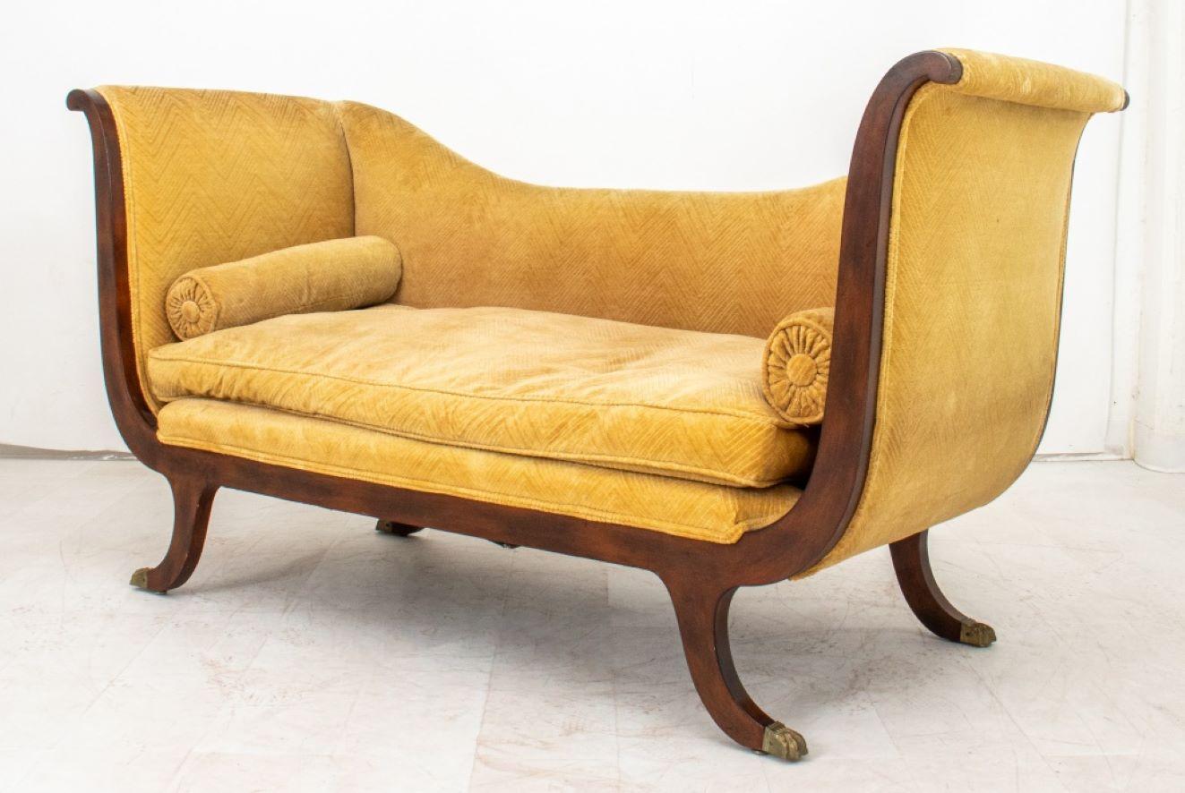 Louis Philippe Style Mahogany Meridienne, circa 1890, with scrolling arms and splay legs terminating in paw feet, now upholstered in gold chevron patterned cut velours. 35
