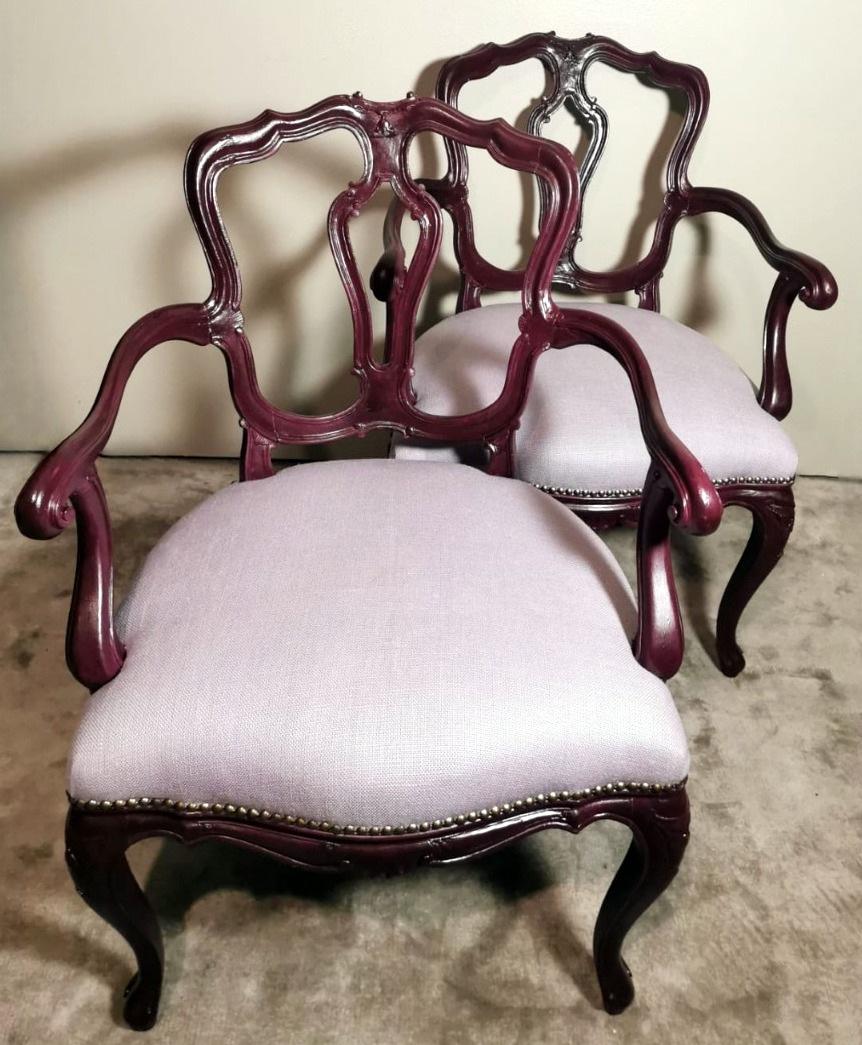 Fascinating and rare pair of Italian chairs with armrests model 
