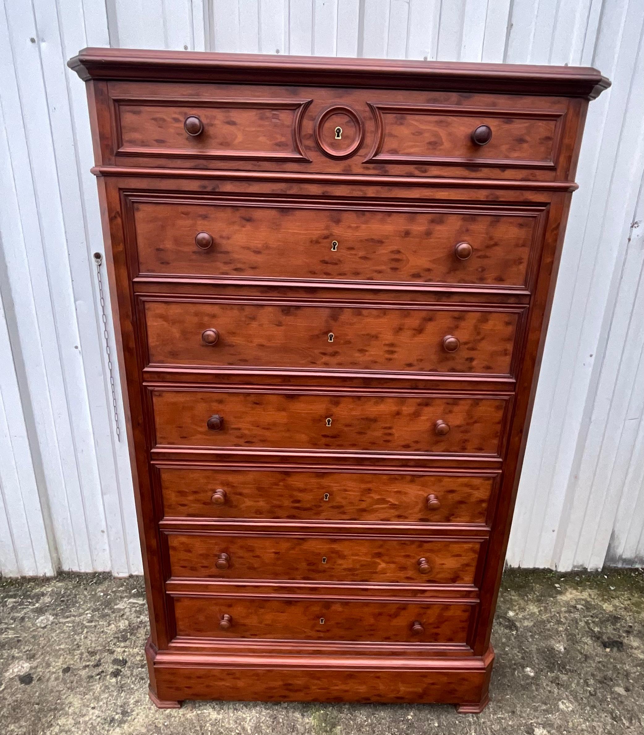 Louis Philippe Style Speckled Mahogany Weekly Chest, Late 19th Century

This very functional piece of furniture was very popular with the bourgeois women. It was of great convenience and already adapted to more cramped apartments.

It was mainly