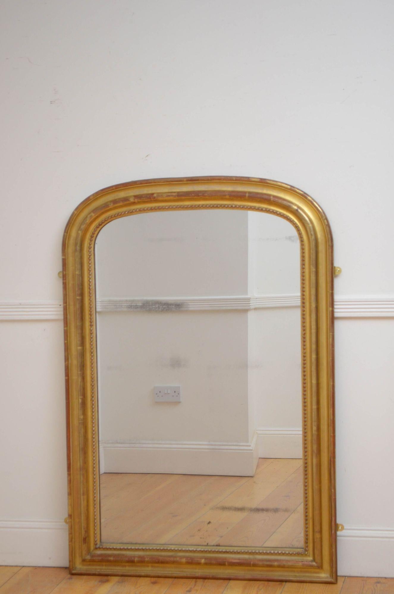 Sn5367 Louis Philippe giltwood mirror, having original glass with some foxing in moulded and gilded frame with beaded decoration to the edge. This antique mirror retains its original gilt, original glass and original backboards, all in home ready