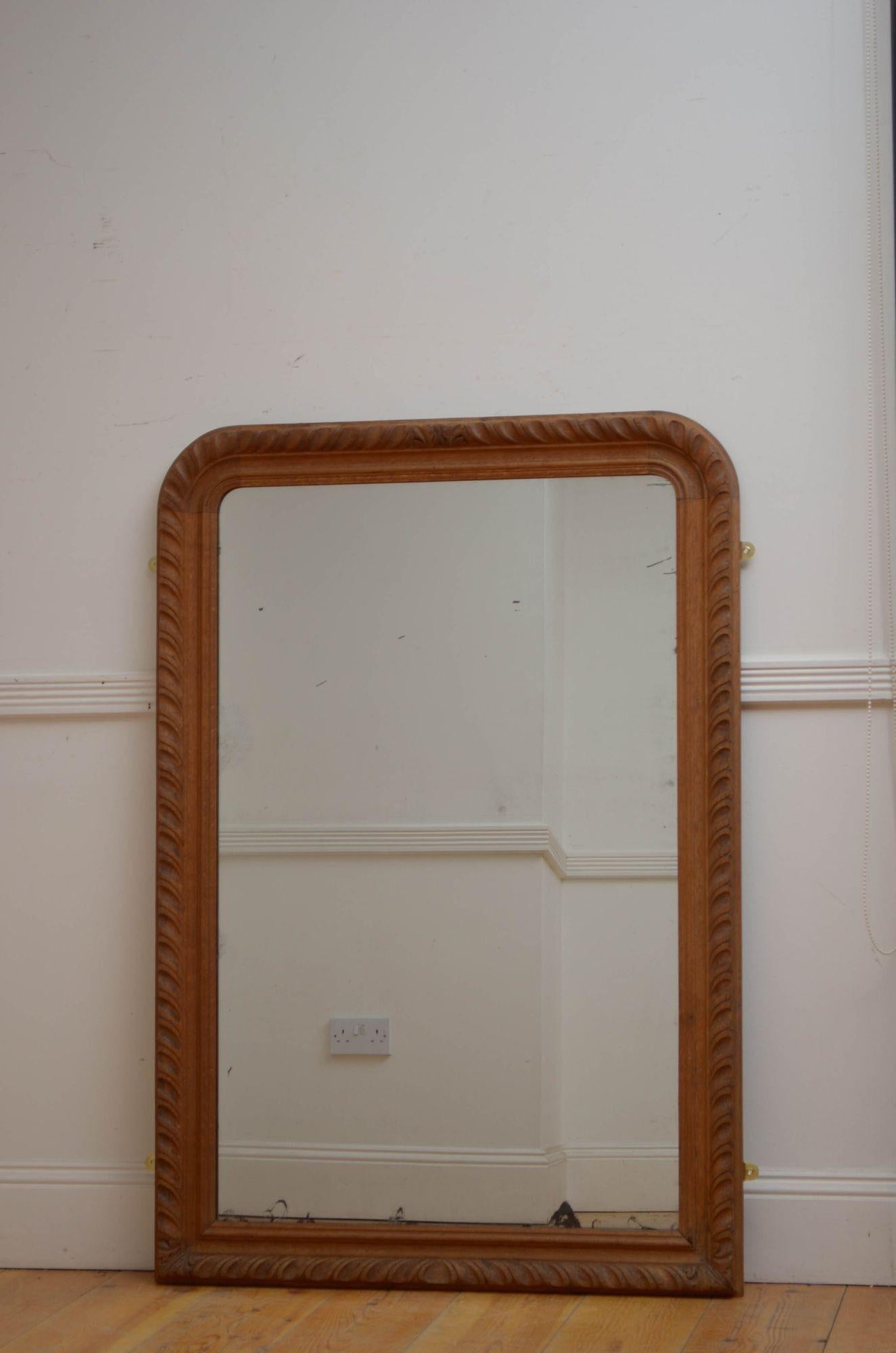 Sn5366 Attractive Louis Philippe wall mirror in oak, having original foxed glass in oak gadrooned carved frame. This antique mirror retains its original glass, good oak frame and replacement back, all in home ready condition. c1850
Measures: H 51