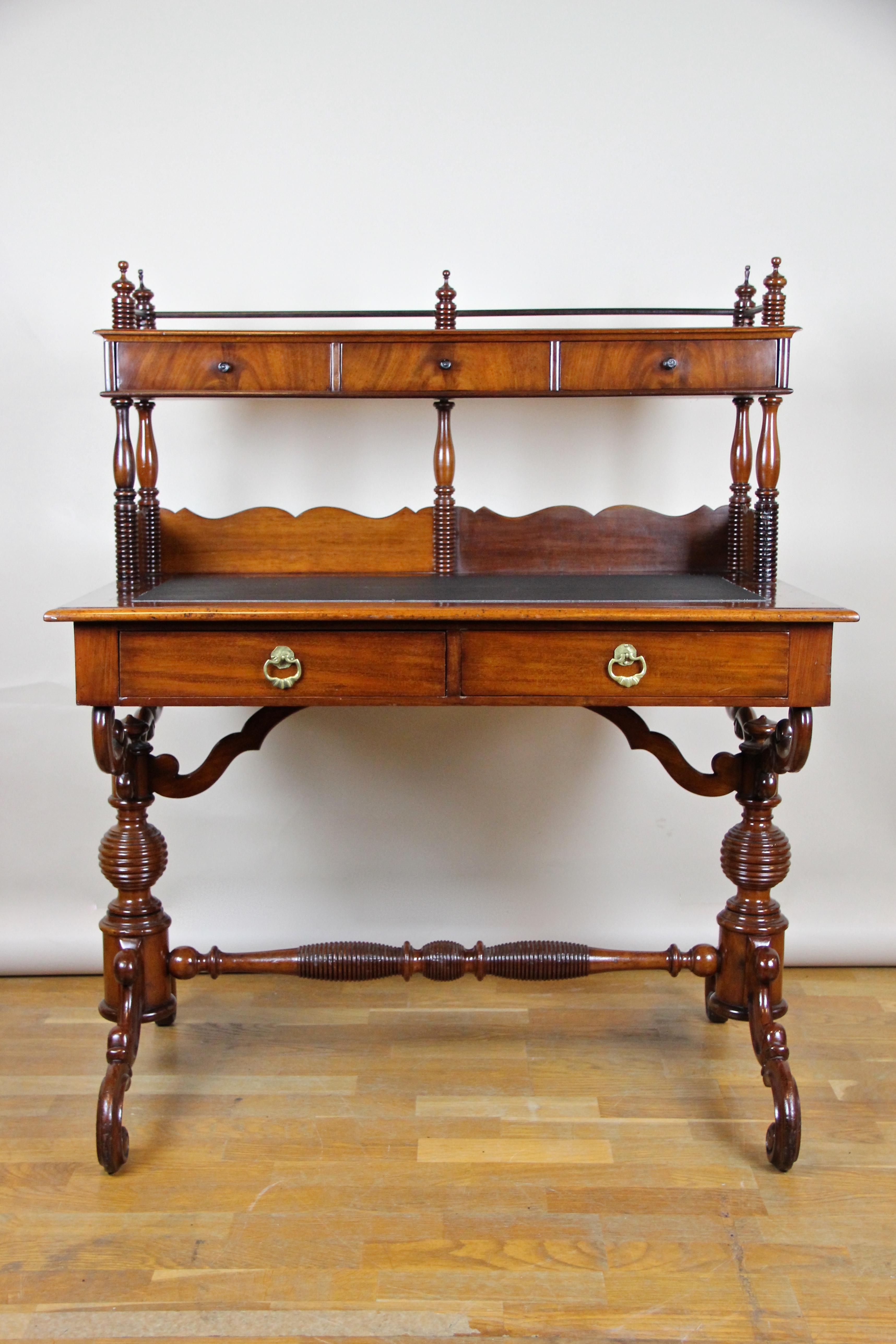 Extraordinary Louis Philippe writing desk out of France from the period, circa 1860. This impressing restored antique desk from the famous Louis Philippe era shows best the recurring influence of the Baroque at this time. This compact sized writing