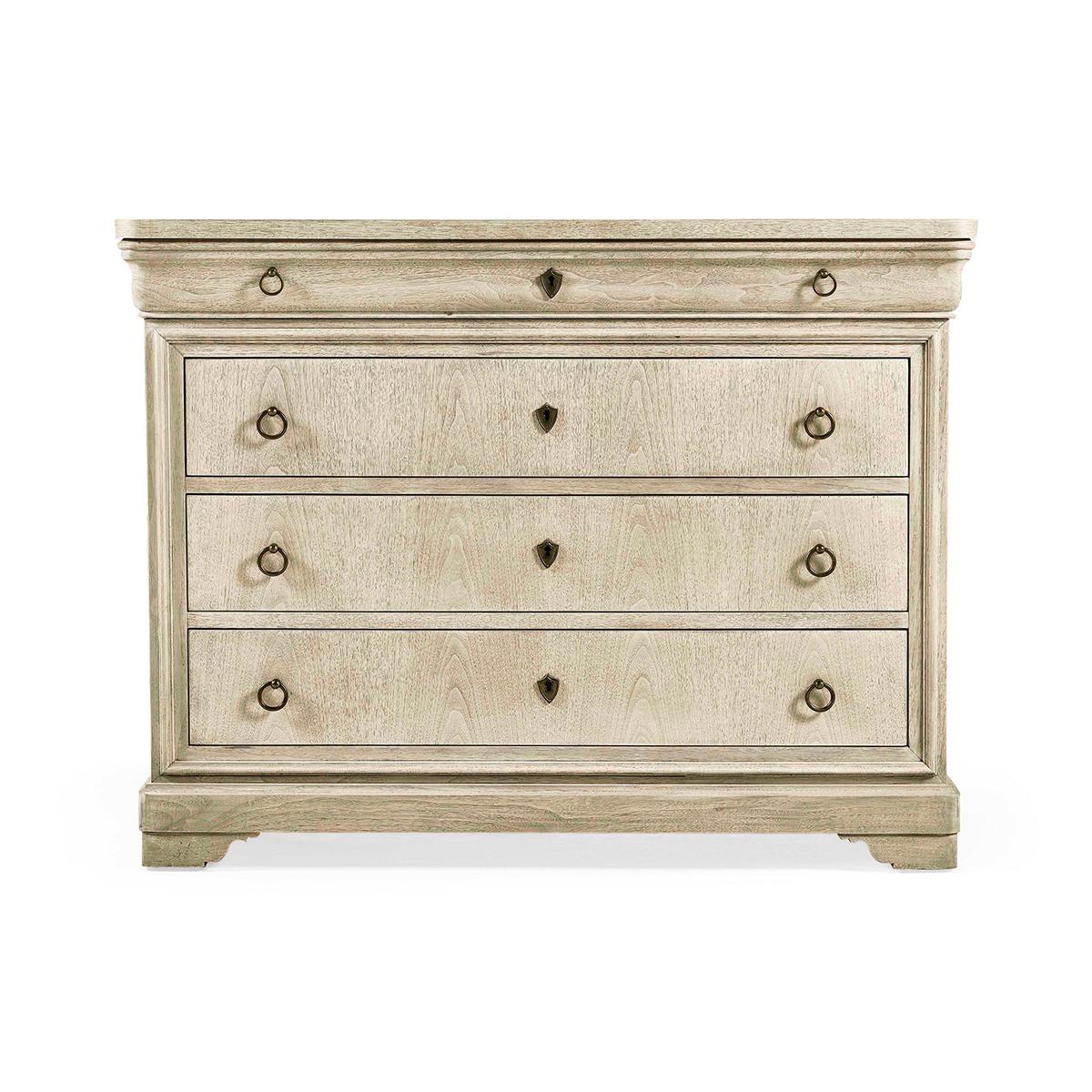 Louis Phillipe Dresser, with clean lines, this four-drawer dresser is a sophisticated balance and has a functional aesthetic, a quintessential expression of timeless charm and old-world refinement. With a bleached walnut finish that elevates this