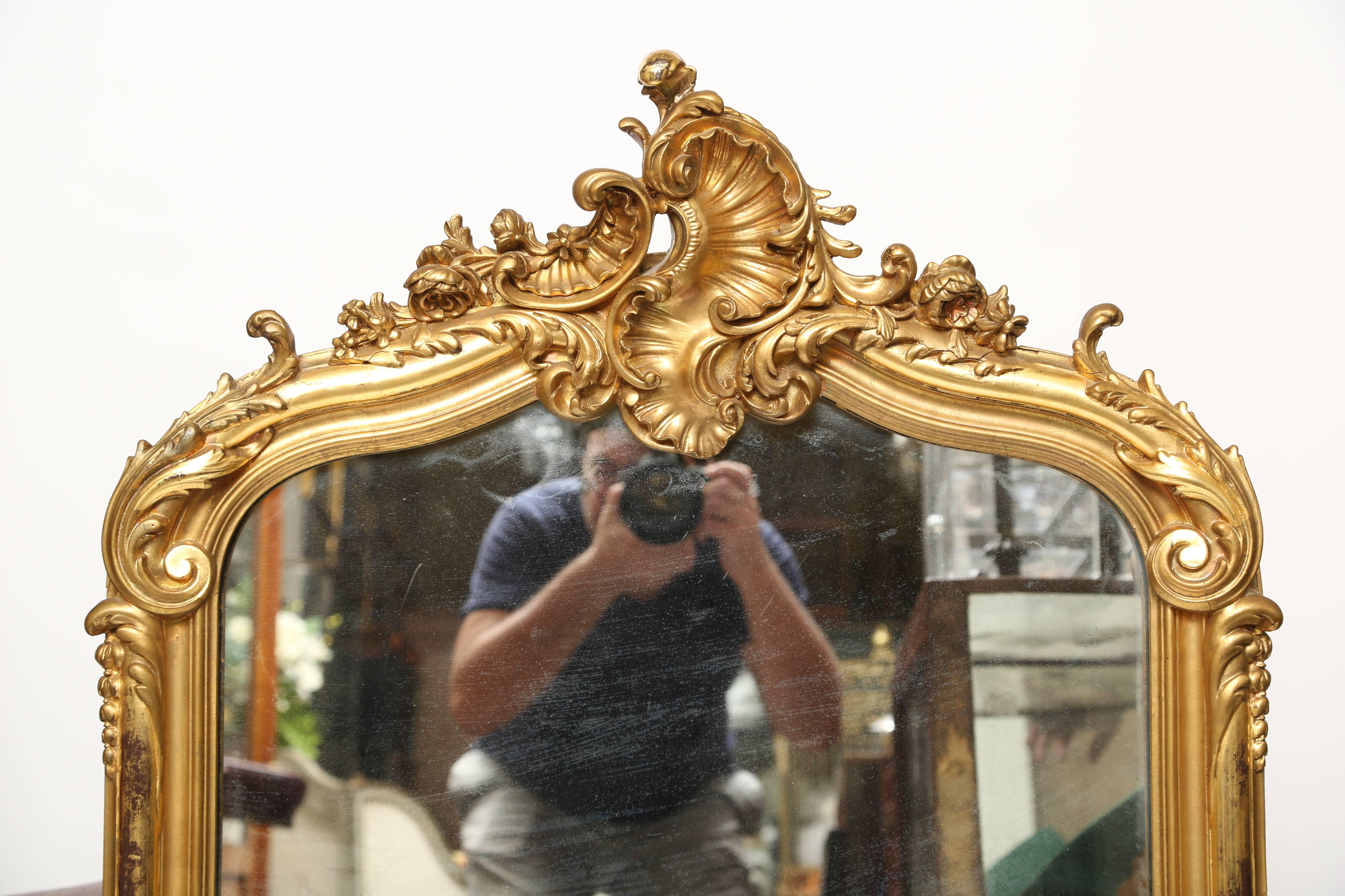Period Louis Phillippe gilt mirror with acanthus leaves on the corners and 