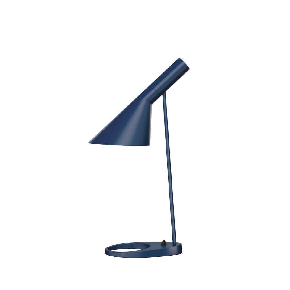 Louis Poulsen, AJ color mini table lamp by Arne Jacobsen
Measures: Width x height x length (mm)
113 x 433 x 183, 1.3 kg
Material: Spun steel. Injection moulded zinc base. Cord length 2.4 m. Switch: In the lamp base.