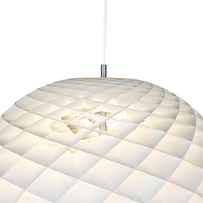 About This Product
The Patera pendant was designed by Øivind Slaatto, who based it on the mathematics of the Fibonacci sequence. The poetic 360-degree glow of the Patera is derived from its many small diamond-shaped cells, which are assembled by