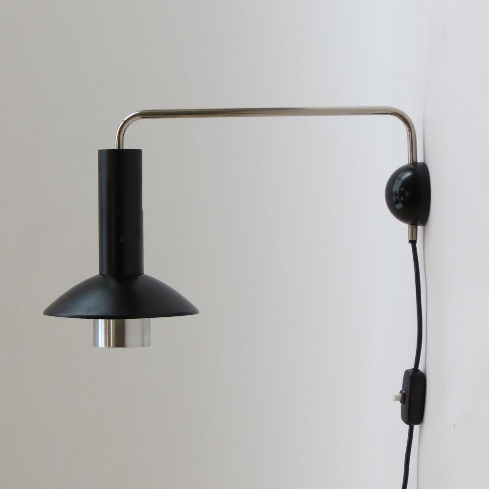 Vintage wall light by Louis Poulsen, made from aluminium and steel with nickel plated adjustable arm that swings from side to side. Also has an adjustable shade.
In very good condition, very little use, retains the original label to the shade. The