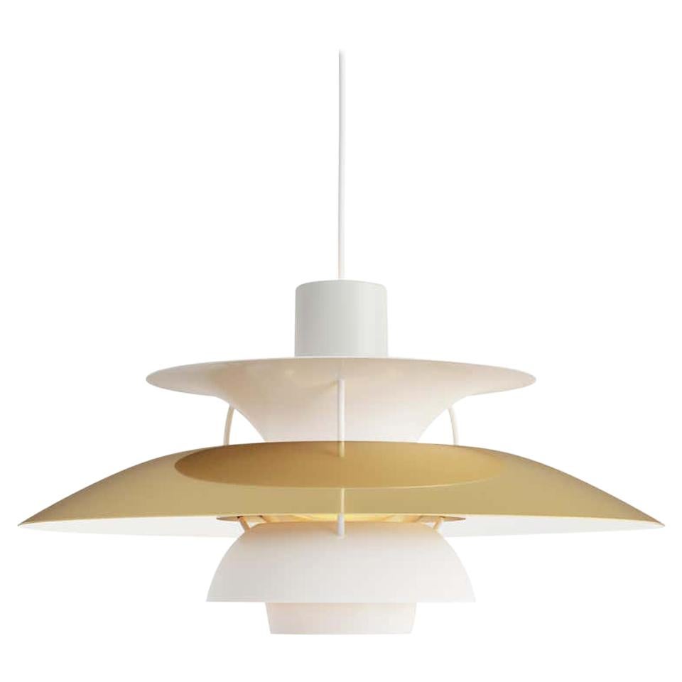 Louis Poulsen, medium metal pendant light by Poul Henningsen.
Measures: Width x height x length (mm)
300 x 163 x 300, 2.0 kg
Material: Polished copper or brass and white matte lacquered aluminum. Anti-glare shade: copper or brass. Struts: white,