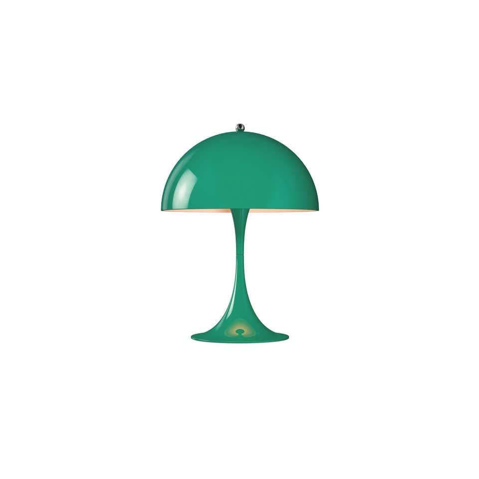 Louis Poulsen, table color lamp by Verner Panton
Width x Height x Length (mm)
250 x 335 x 250, 1.2 kg
Surface: acrylic Material: Shade: Vacuum formed opal acrylic. Base: Aluminium. Cord length: 2.5 m Switch: On the cord with stepless dimming