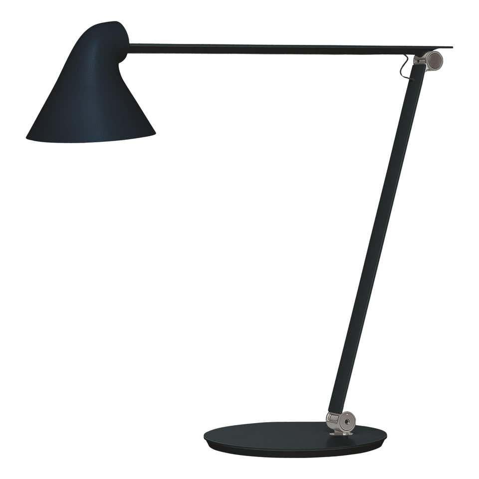 Louis Poulsen, NJP table lamp by Oki Sato
Size: Width x height x length (mm)
220 x 480 x 480, 5.1 kg
Material: Foot and base: Steel. Arms and lamp head: Aluminum. LED: Anodised aluminum, cord length: 2 m. Switch: On cord with two dimming settings.