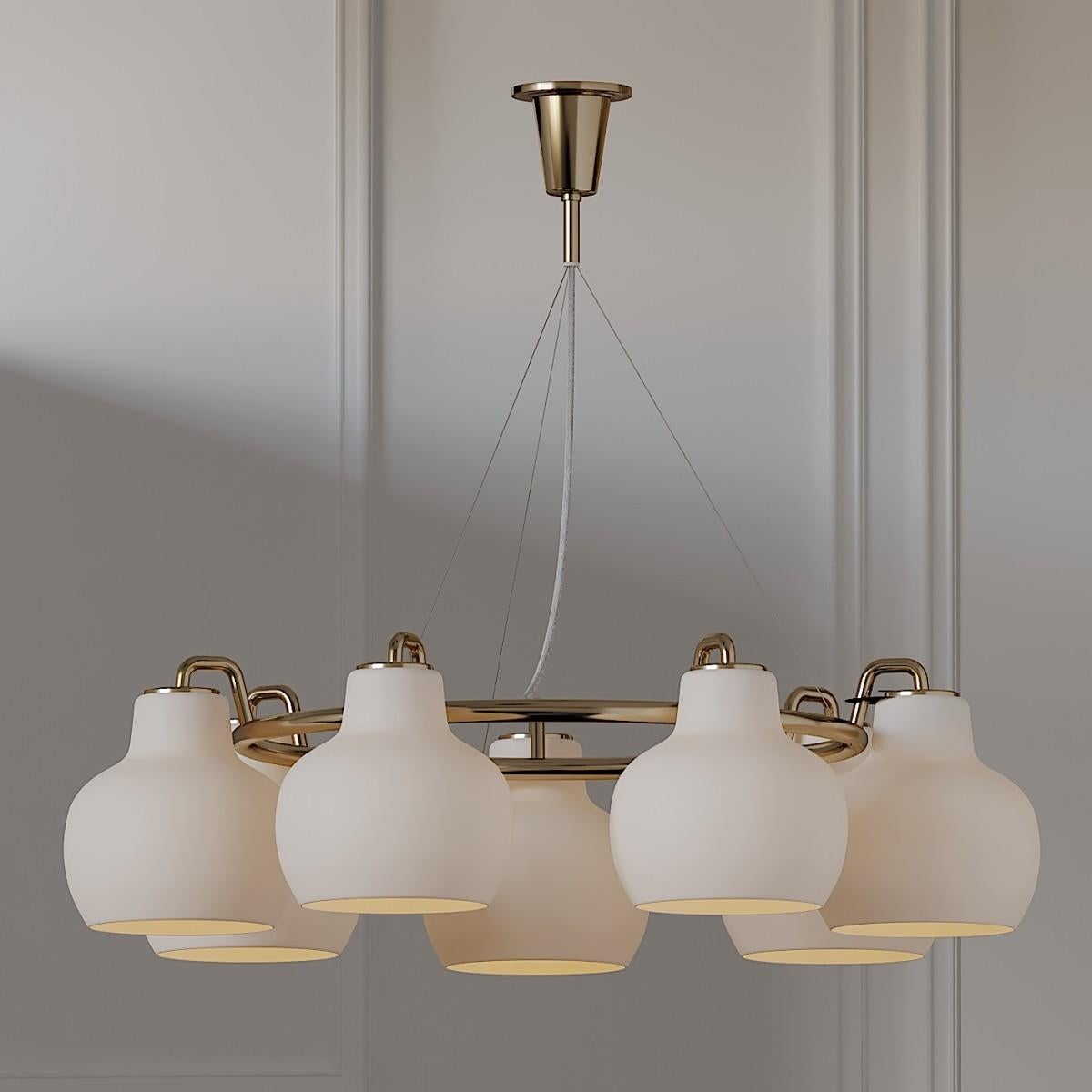 Louis Poulsen, pendant 7 light by Vilhelm Lauritzen
Measures: Width 893 x height 233 x length 893(mm), 10.8 kg
 
7 Shades. Material: Shades: Mouth-blown, 3-layered, polished opal glass. Frame and canopy: Satin polished brass, untreated. Please