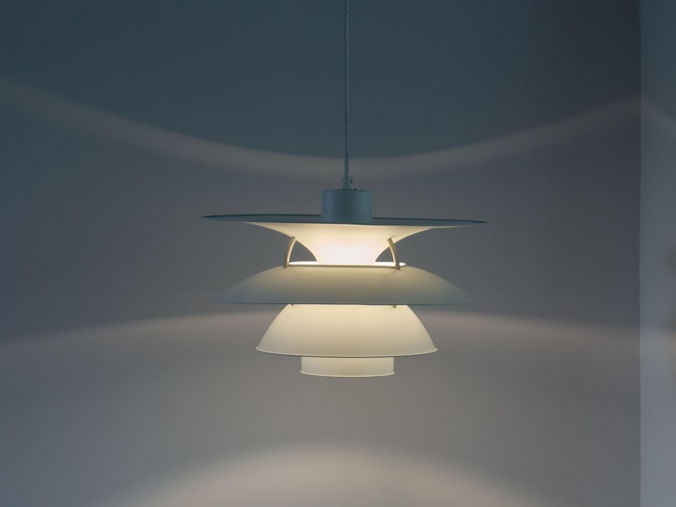 Iconic Danish design hanging lamp designed by the famous Poul Henningsen and in 1979 and 1984 revisited by Sophus Frandsen and Ebbe Christensen for Louis Poulsen of Denmark.

This 1980s model of the famous Charlottenborg was designed specifically