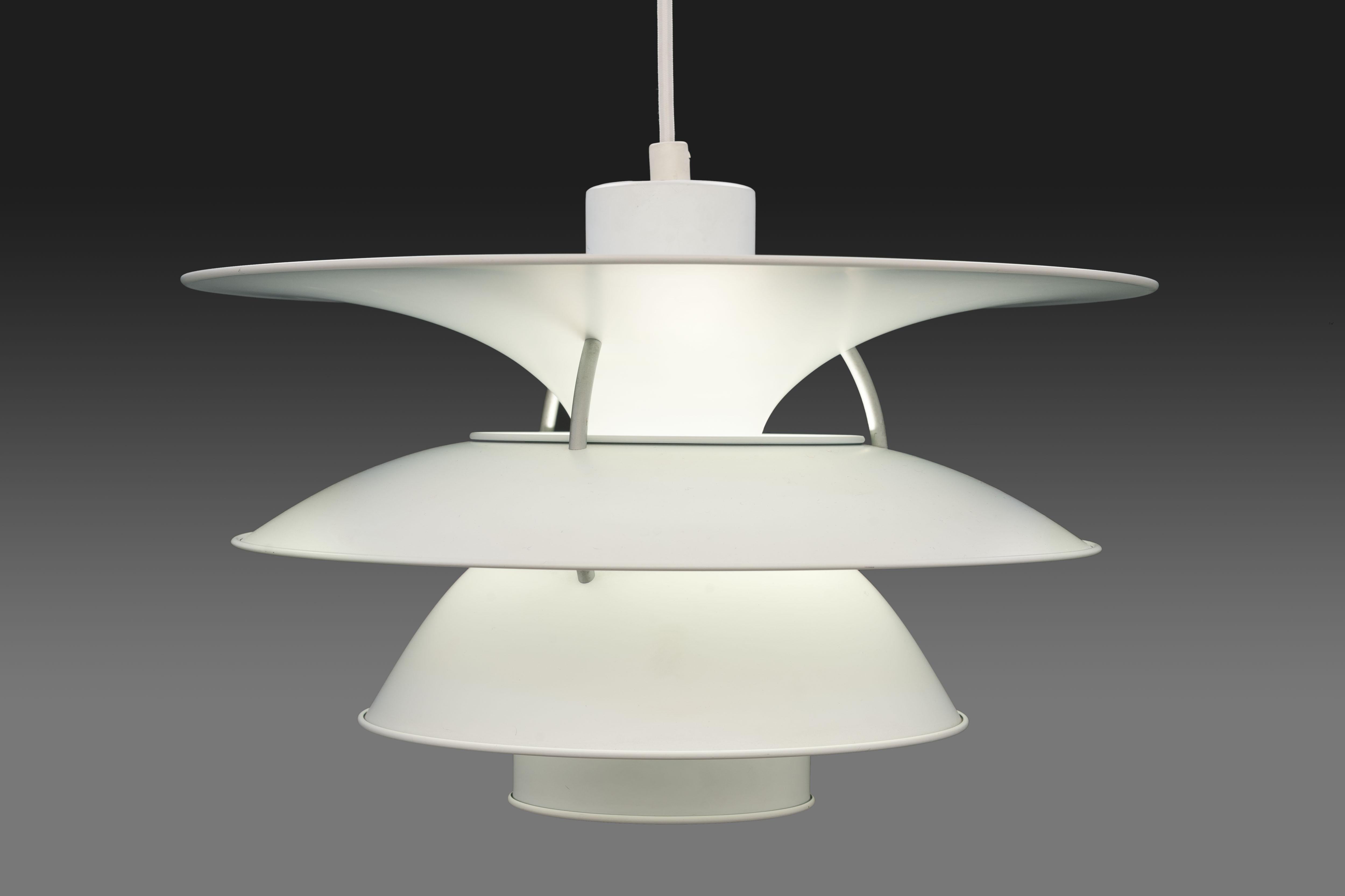 Beautiful large 'Charlottenborg' pendant designed in 1979 by Sophus Frandsen and Ebbe Christensen based on drawings from 1940 by Danish designer Poul Henningsen. The lamp was specially developed for the 'Charlottenborg' exhibition hall in Copenhagen