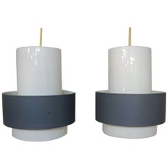 Louis Poulsen: Set of Two Pendants with Shades of Grey Metal and White Plastic. 