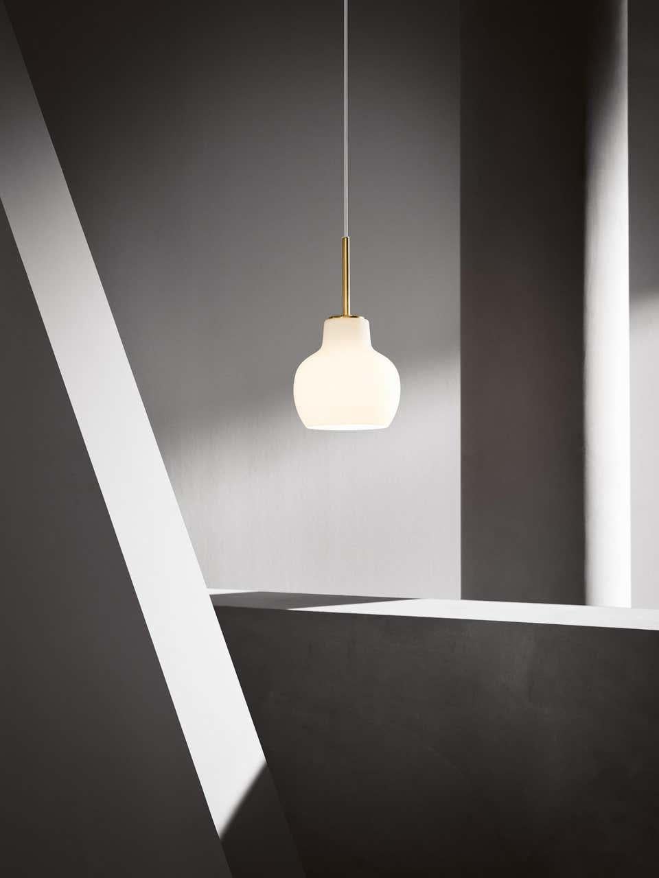 Louis Poulsen, small round glass pendant light by Vilhelm Lauritzen.
Size: Width x height x length (mm)
190 x 342 x 190, 1.2 kg
Material: Shade: Mouth-blown, 3-layered, polished opal glass. Suspension: Satin polished brass, untreated. Please note