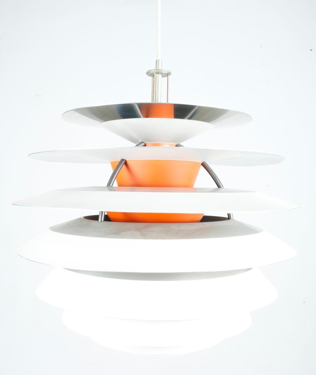 Unique beautiful vintage Aluminum pendent light with orange fixture, Great design and style. No canopy included. This light also has chrome accent. Works perfectly.