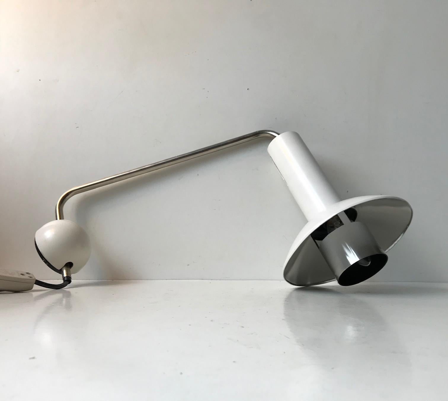 A rare sized white wall light designed and manufactured by Louis Poulsen in Denmark during the 1970s. This model - 132051 is called 'Louise' and is obviously derived from Louis in Louis Poulsen. This one is the 'largest' in the series because the