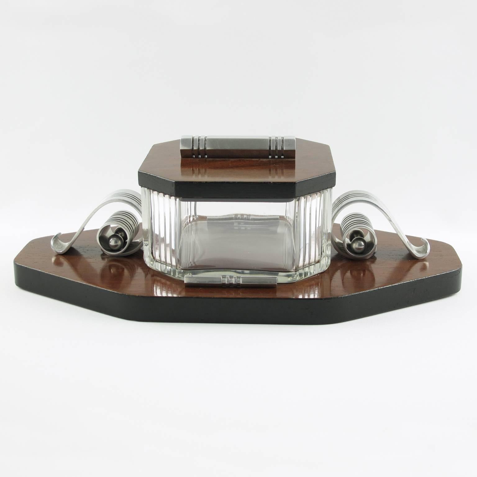 French Art Deco modernist cookie or candy serving jar or large decorative box by Louis Prodhon. Beautiful rosewood veneer with black edging serving tray base with polished cast aluminum accents. Heavy handmade cut crystal liner, very thick, with