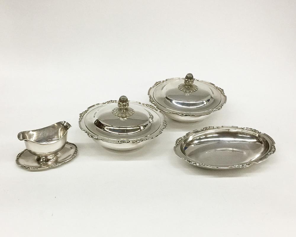Louis Quinze sterling silver covered serving dishes, sauce boat and oval serving dish.

1970s, Germany marked, 925 sterling silver
Also marked with ZI, Dutch Silver mark

The objects have been used and have traces of use. 
A lid has two small