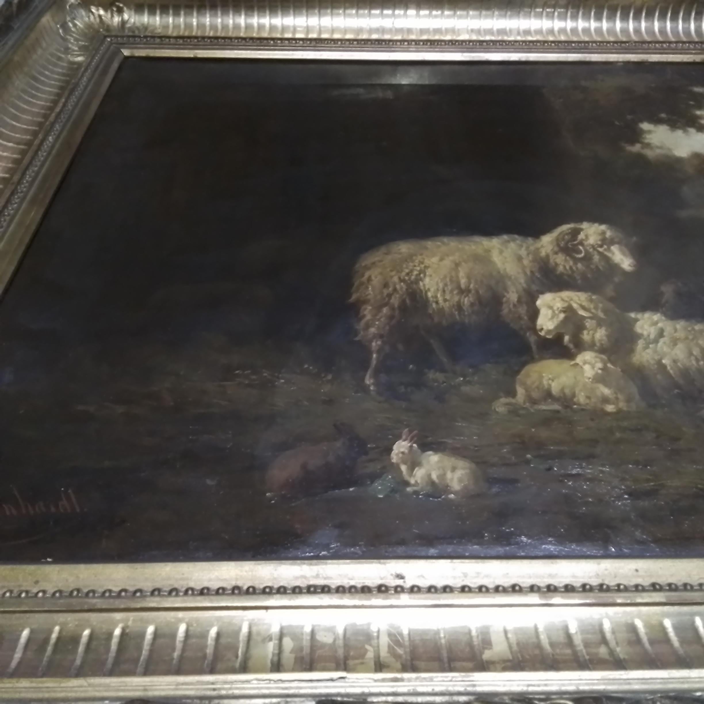 Antikes Kunstgemälde mit Schafen in einer Scheune – Painting von Louis Reinhardt