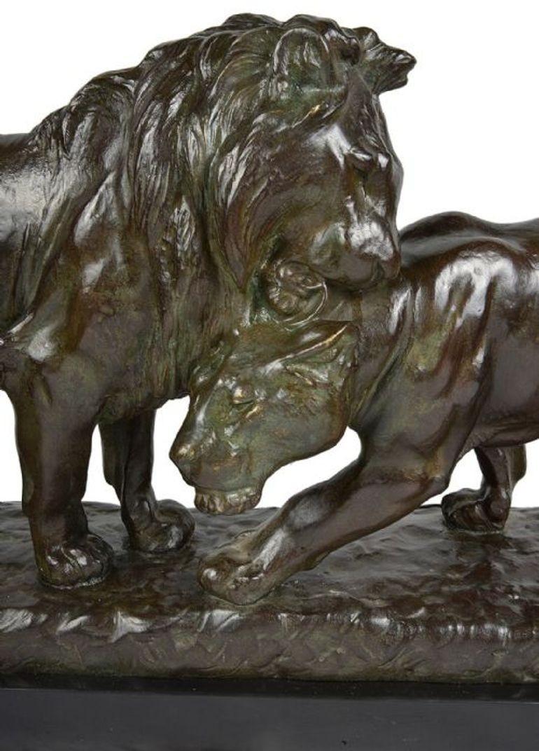 A very good quality late 19th-early 20th century Bronze study of a male lion and lioness,
Signed; L. Riche, French, 1877-1949.